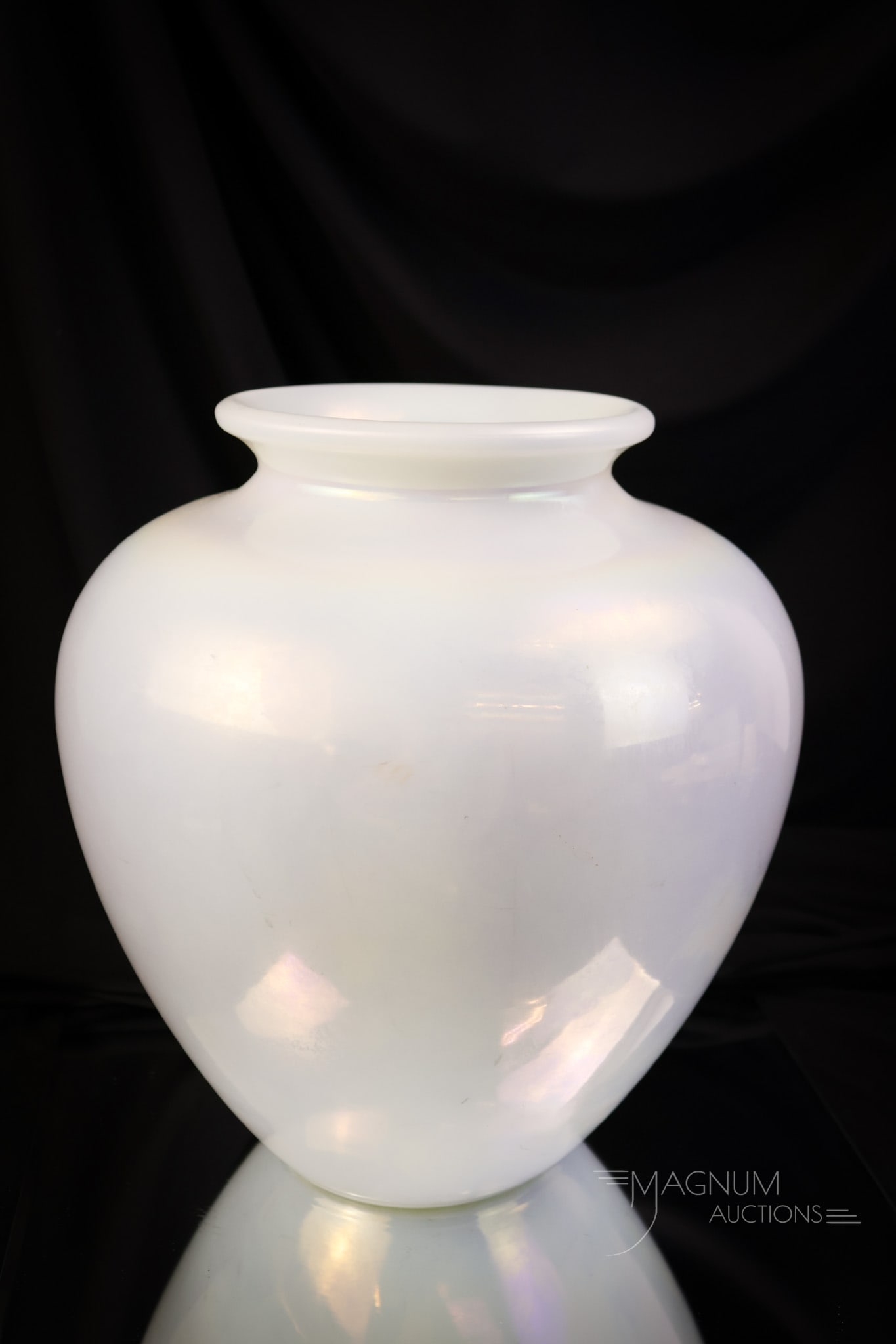Signed Steuben Ivrene Classic Form 11" Vase: A fine example of Steuben Ivrene in the classic form. This vase is signed and measures 11" tall and 9" wide. This one has exquisite iridescence. SHIPPING NOTICE: If you choose not to utilize the LiveA