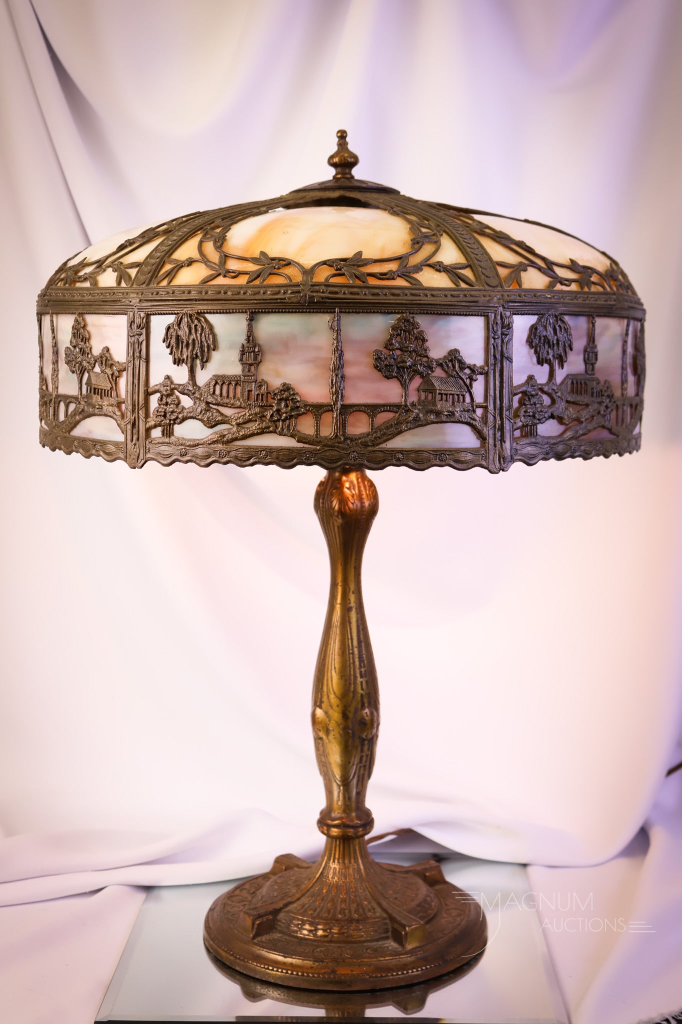 Antique Bent Panel Slag Glass Scenic FiligreeTable Lamp: A lovely addition to any collection. This is estate fresh and straight from the home where it sat for the last 70 years. This bent panel slag lamp features two colors of slag glass and bent panels wit
