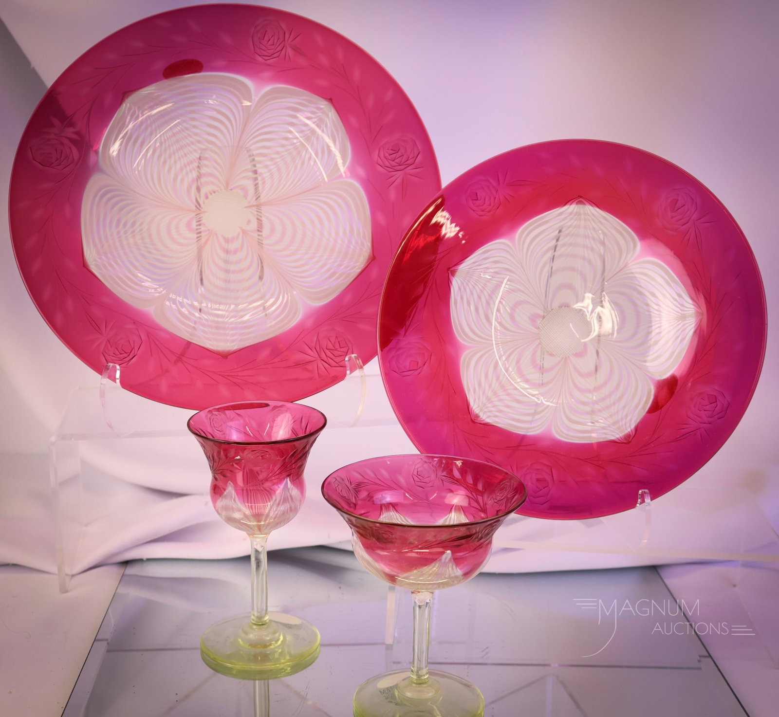 4 pc Lot Durand Ruby Pulled Feather with Rose & Leaf Cutting: A nice offering of four pieces of Durand pulled feather in ruby. All of these pieces have the Rose and Leaf cutting. The lot includes a Sherry glass, a sherbet, a dessert plate, and lastly, a salad pl
