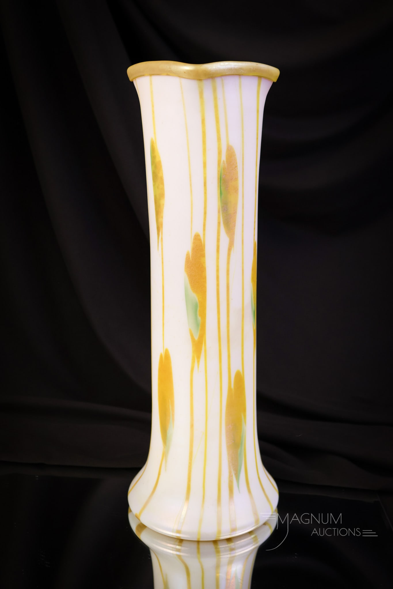 Fostoria Iris Heart & Vine Iridescent Art Glass Vase: A fine Fostoria Iris Heart and Vine art glass vase. This vase has a white body with green and orange hearts. The vase has an iridescent finish. It measures 12" tall and 3 1/4" wide. SHIPPING NOTICE: