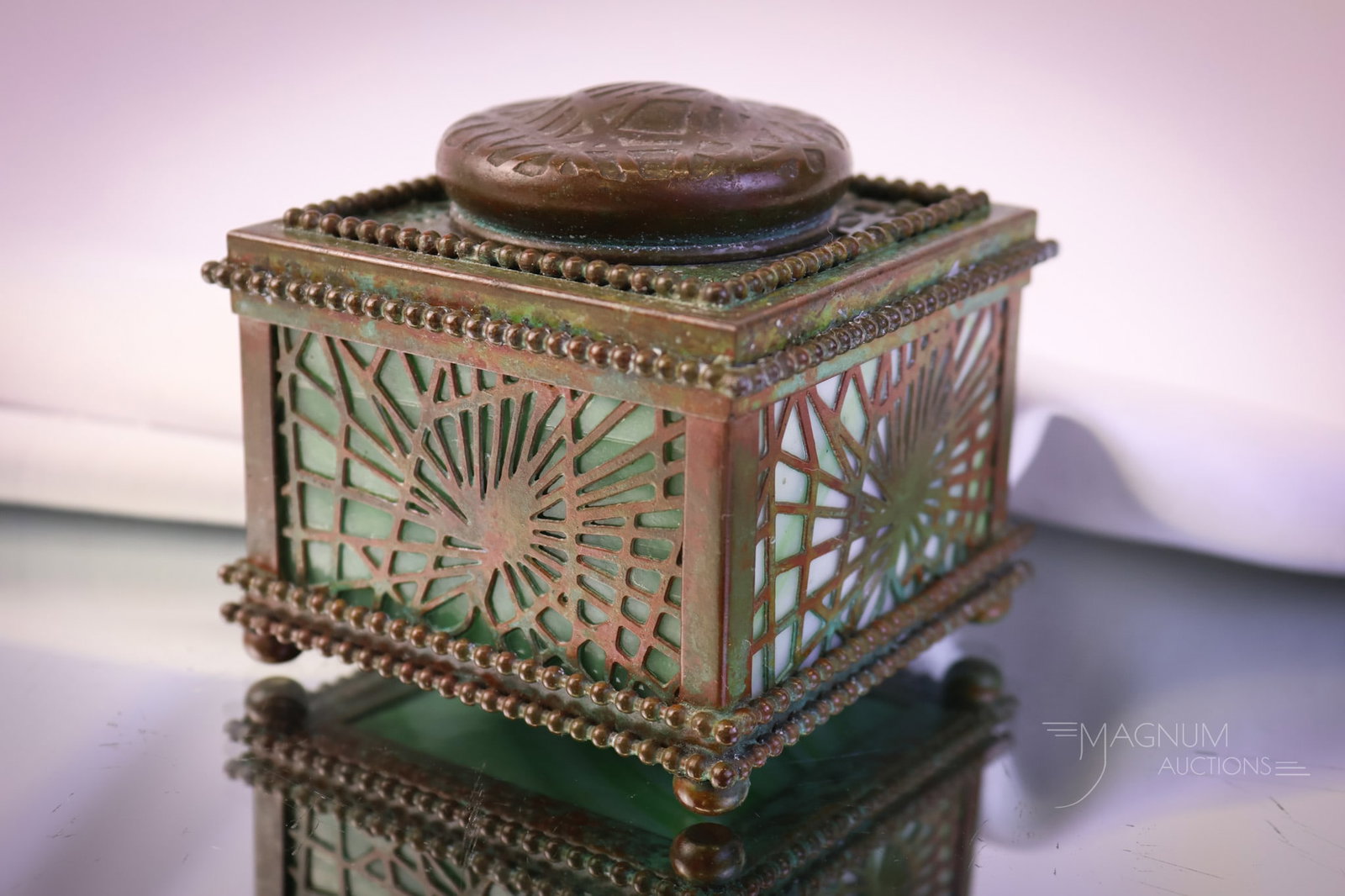 Marked "Tiffany Studios New York 845" Pineneedles Green Slag GlassBronze Inkwell: A marked, "Tiffany Studios New York 845" antique Pineneedles green slag glass and bronze inkwell. This piece features original patina and wonderful condition. The inkwell measures 2 3/4" tall and 3 1/