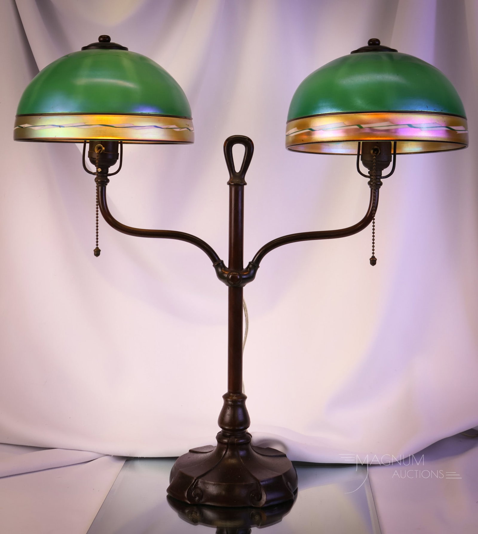 Signed Handel Steuben Intarsia Art Glass Antique Double Student lamp: A rare find in a double student lamp. The base is signed Handel. It is signed on the side of the base and on the label on the felt on the base of the lamp. The shades are Stueben green Intarsia. Each 