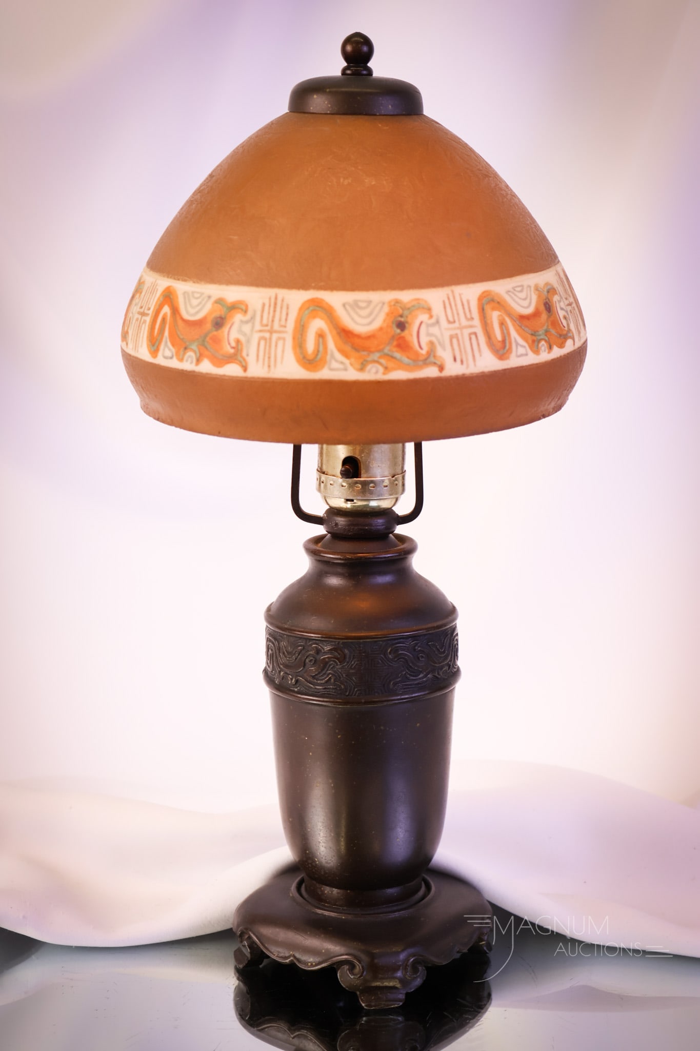 Jefferson Obverse Painted Arts & Crafts Boudoir Antique Table Lamp: A sweet find in a Jefferson obverse-painted Arts & Crafts period table lamp. This lamp features a chipped ice finish shade with a dragon motif matching that on the base. The lamp measures 14 1/2" tall