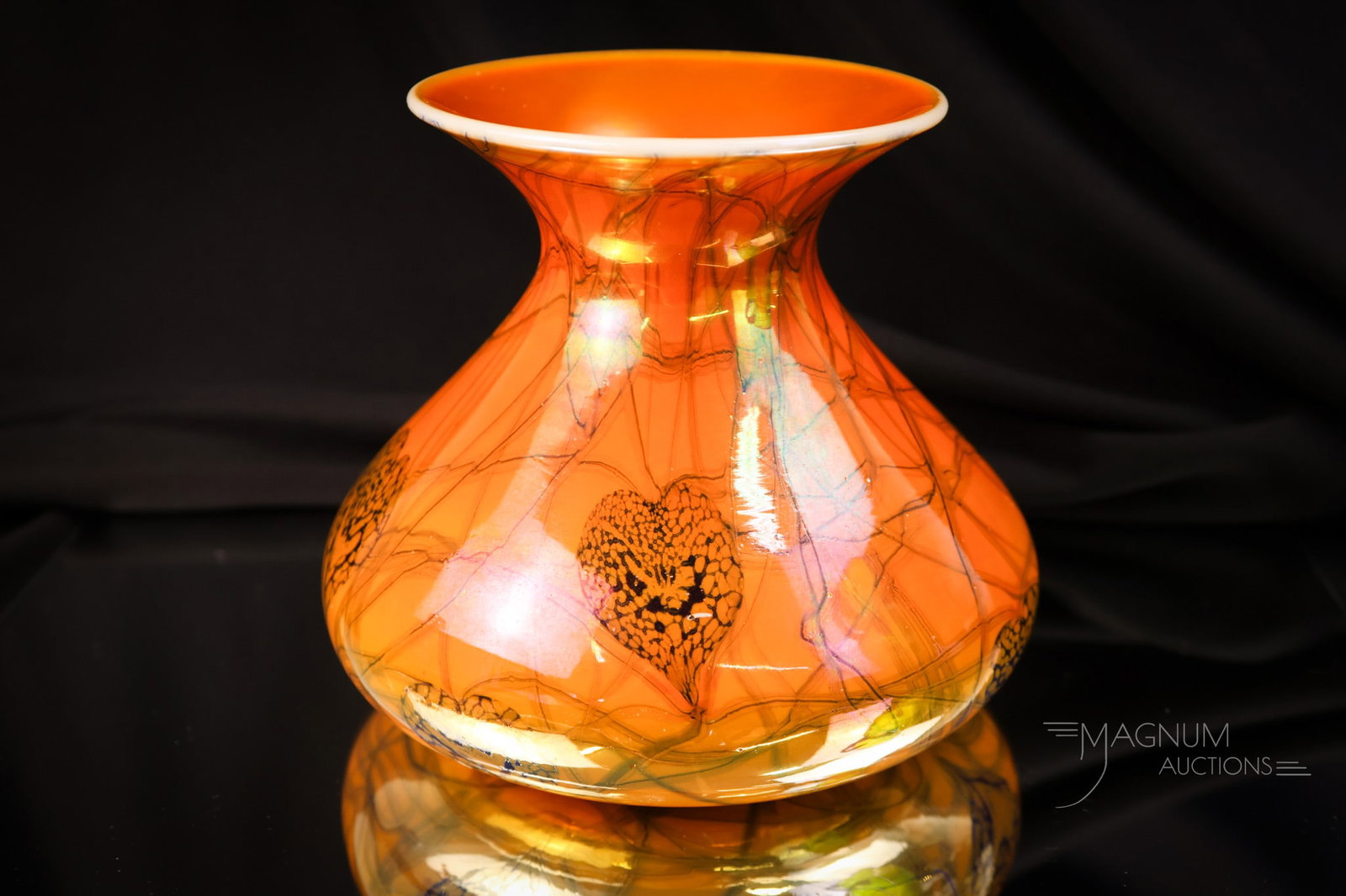 Imperial Freehand Lily Pad & Vine Orange& Blue Iridescent Art Glass Vase: Another fine example of Imperial freehand art glass. This vase is in orange iridescent glass with blue pads. The vase measures 4 1/2" tall and 5" wide. SHIPPING NOTICE: If you choose not to utilize th