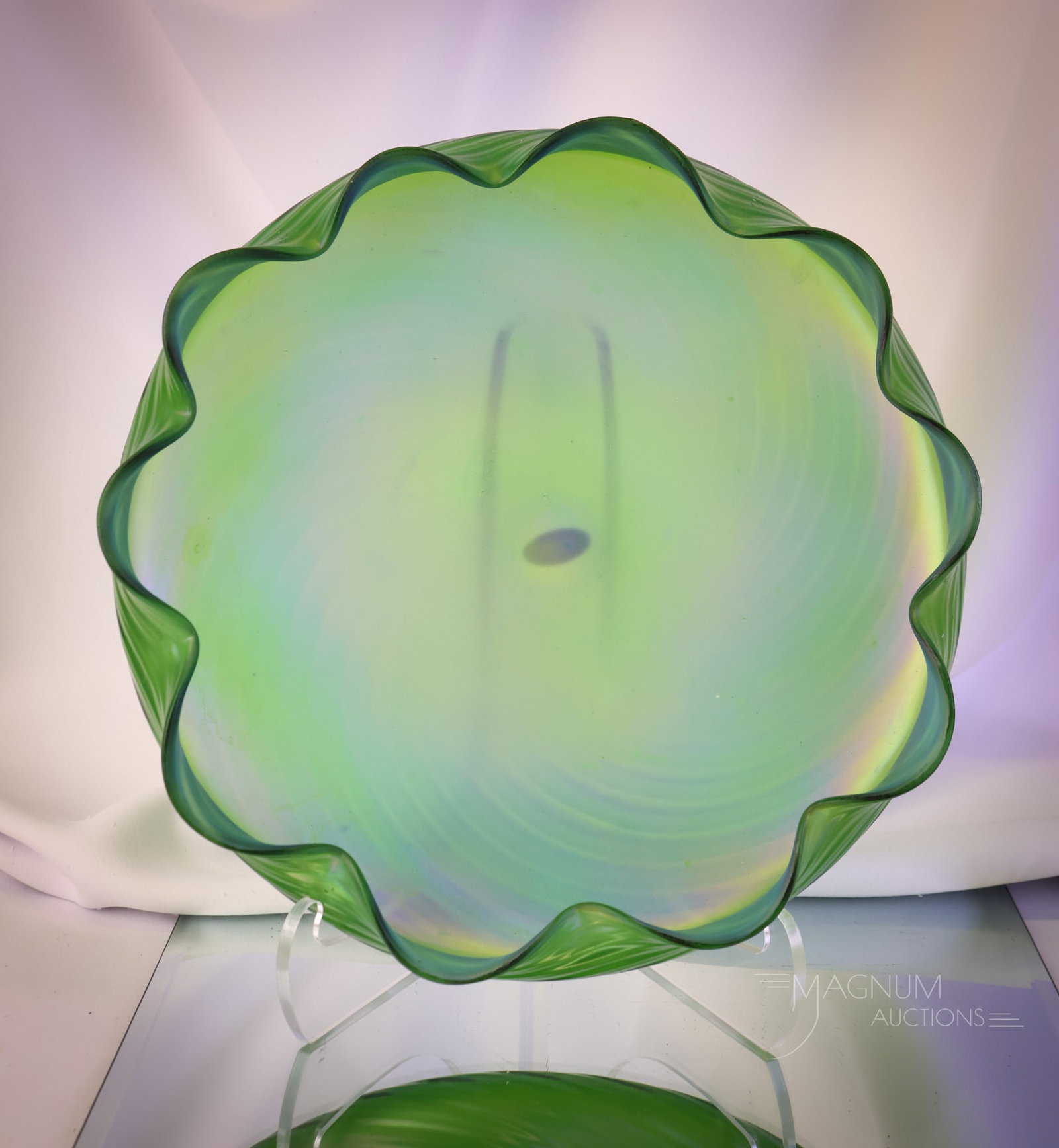 Monumental Kralik Green Iridescent Art Glass 12" Bowl: A monumental find in Kralik glass. This is a 12" diameter bowl in green iridescent glass with a swirl pattern. This piece has a rainbow-colored iridescent interior. Beautiful! SHIPPING NOTICE: If you 