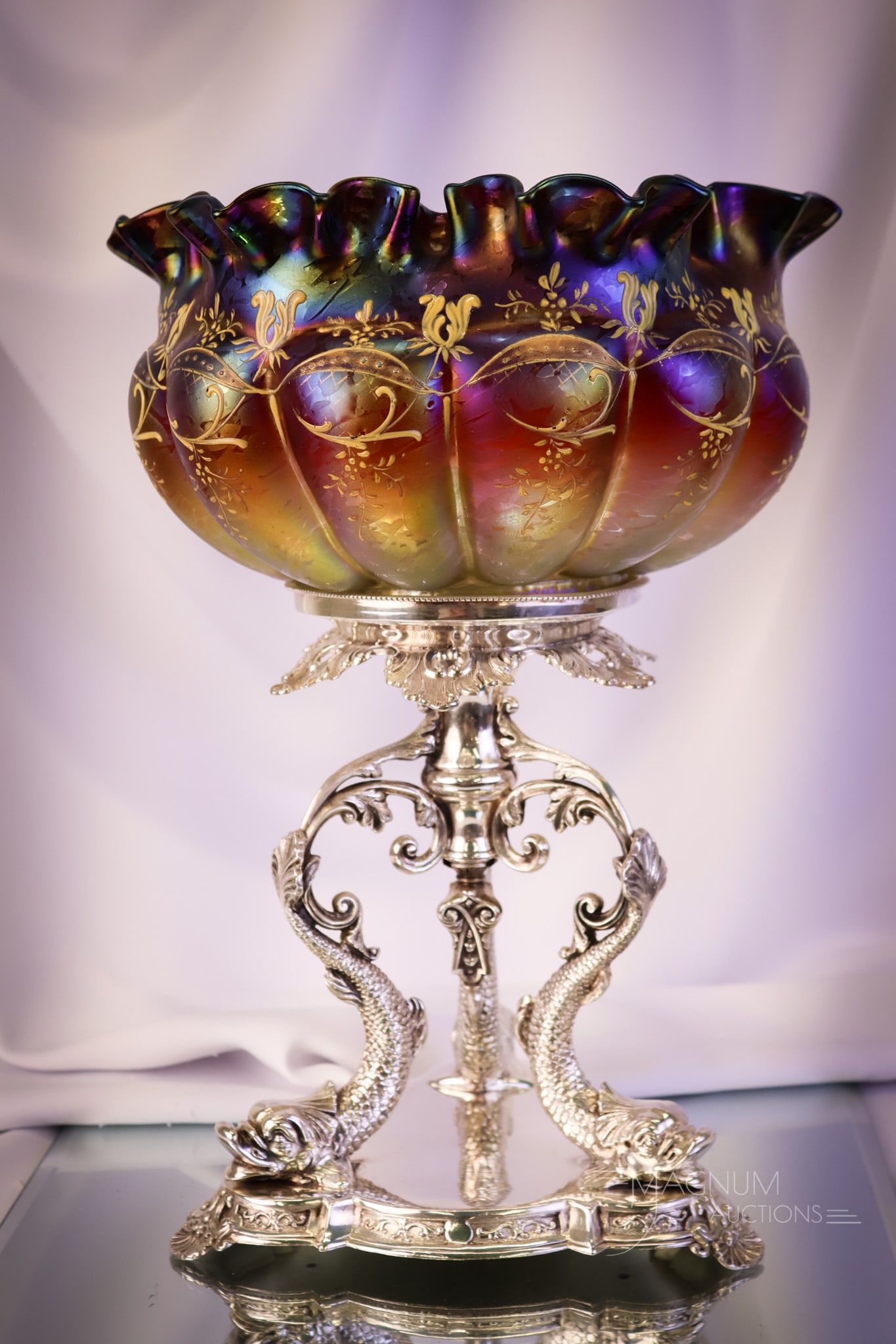 Ashderry & Sons, Sheffield Silverplate Rindskopf Iridescent Brides Bowl Centerpiece: A gorgeous Victorian Silverplate and art glass brides' bowl centerpiece. This piece features an amazing Rindskopf art glass bowl in red to orange iridescent glass. It has a lobed body with enamel deco