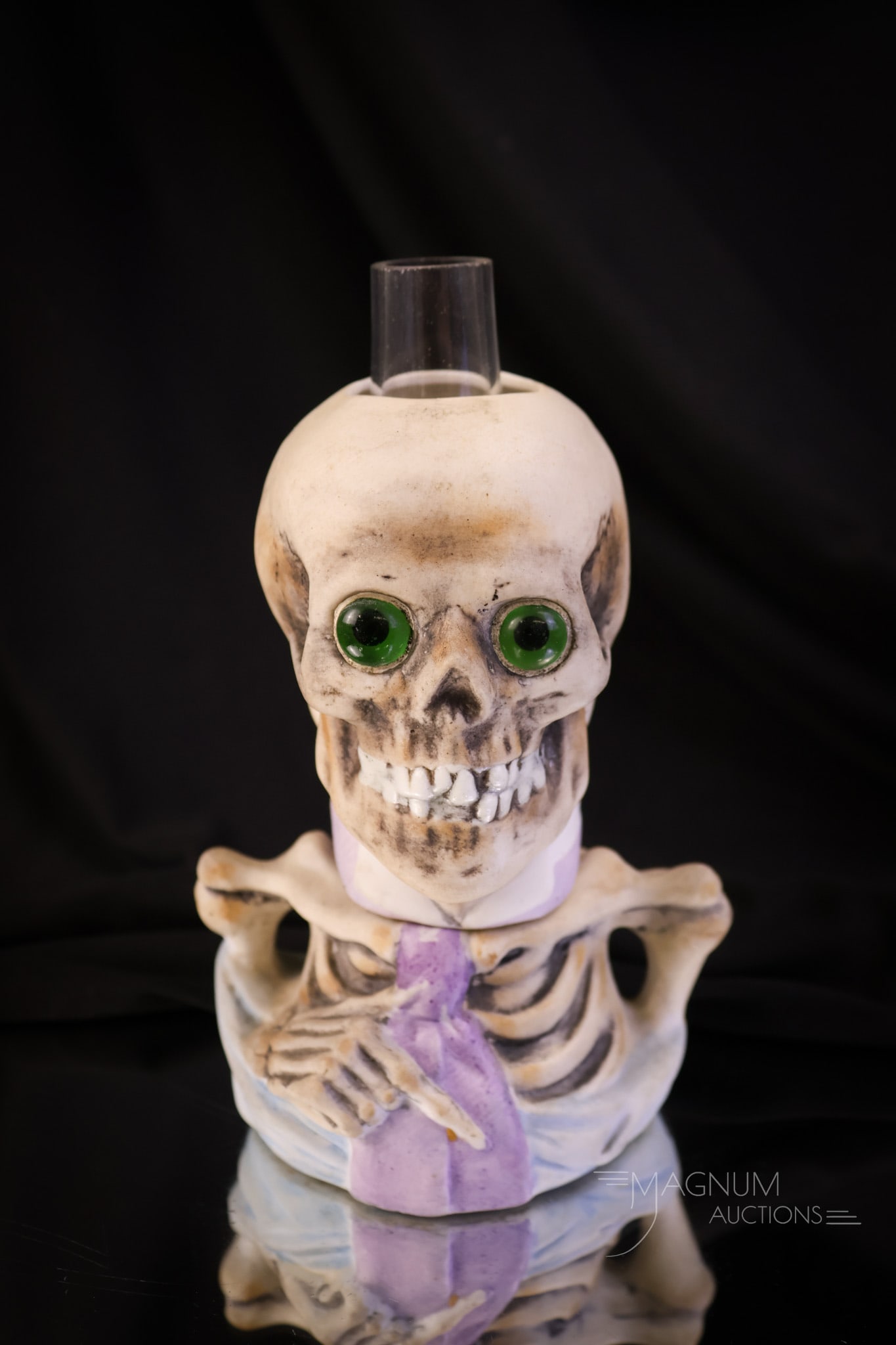Very Rare Victorian Bisque Skeleton Miniature Oil Lamp: A very rare find in a Victorian miniature oil lamp. This is a bisque skeleton figural lamp. This little guy is absolutely perfect. He has brilliant green eyes that light when the lamp is lit. Amazing 