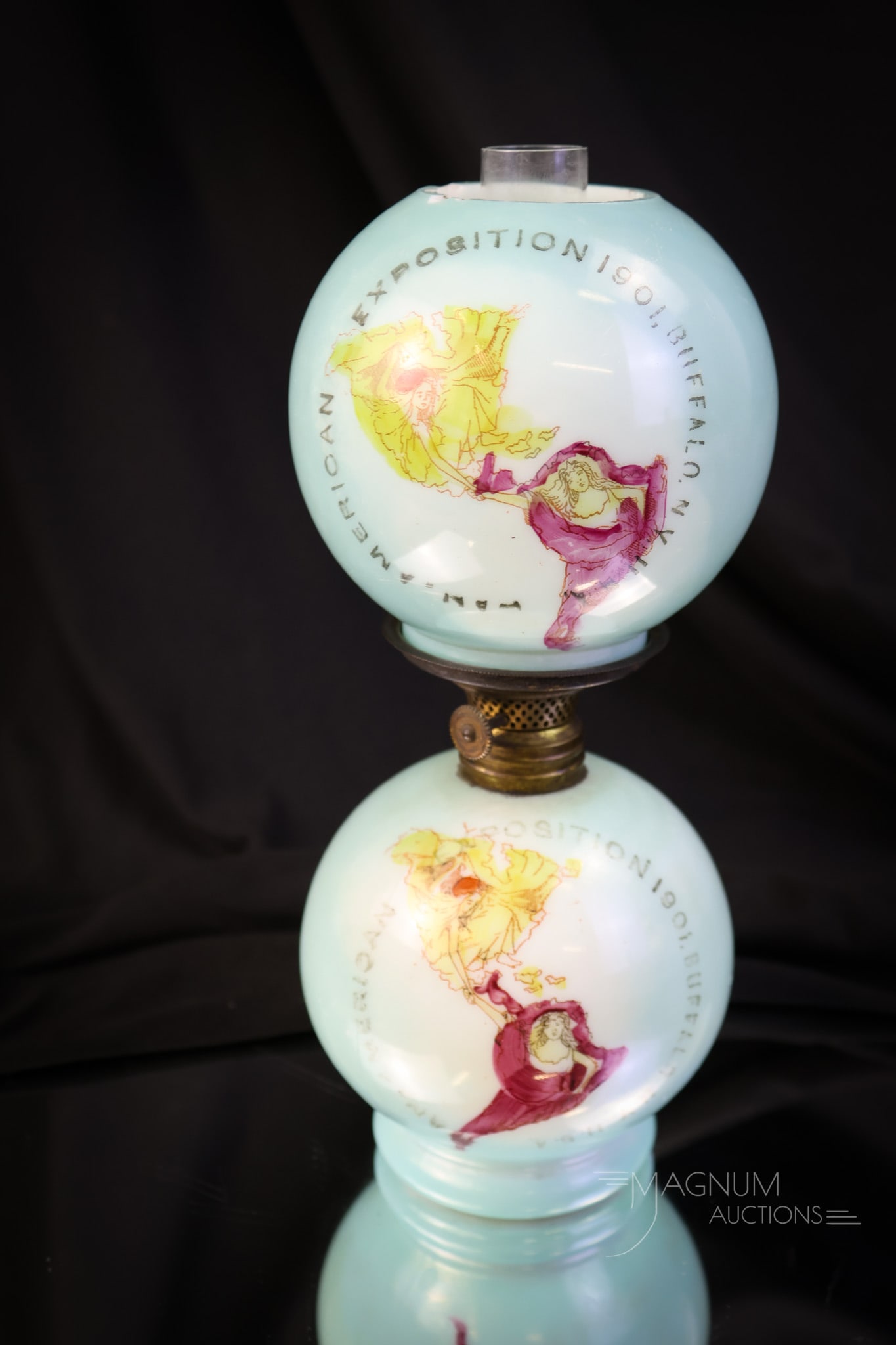 Pan-American Exposition 1901 Buffalo, N.Y. Victorian Miniature Oil Lamp: A sweet little Pan-American Exposition Victorian Miniature Oil Lamp. This lamp is from the 1901 Buffalo, N.Y., exposition. The lamp measures 8 1/2" tall and 3 1/2" wide. A couple of flakes are noted o