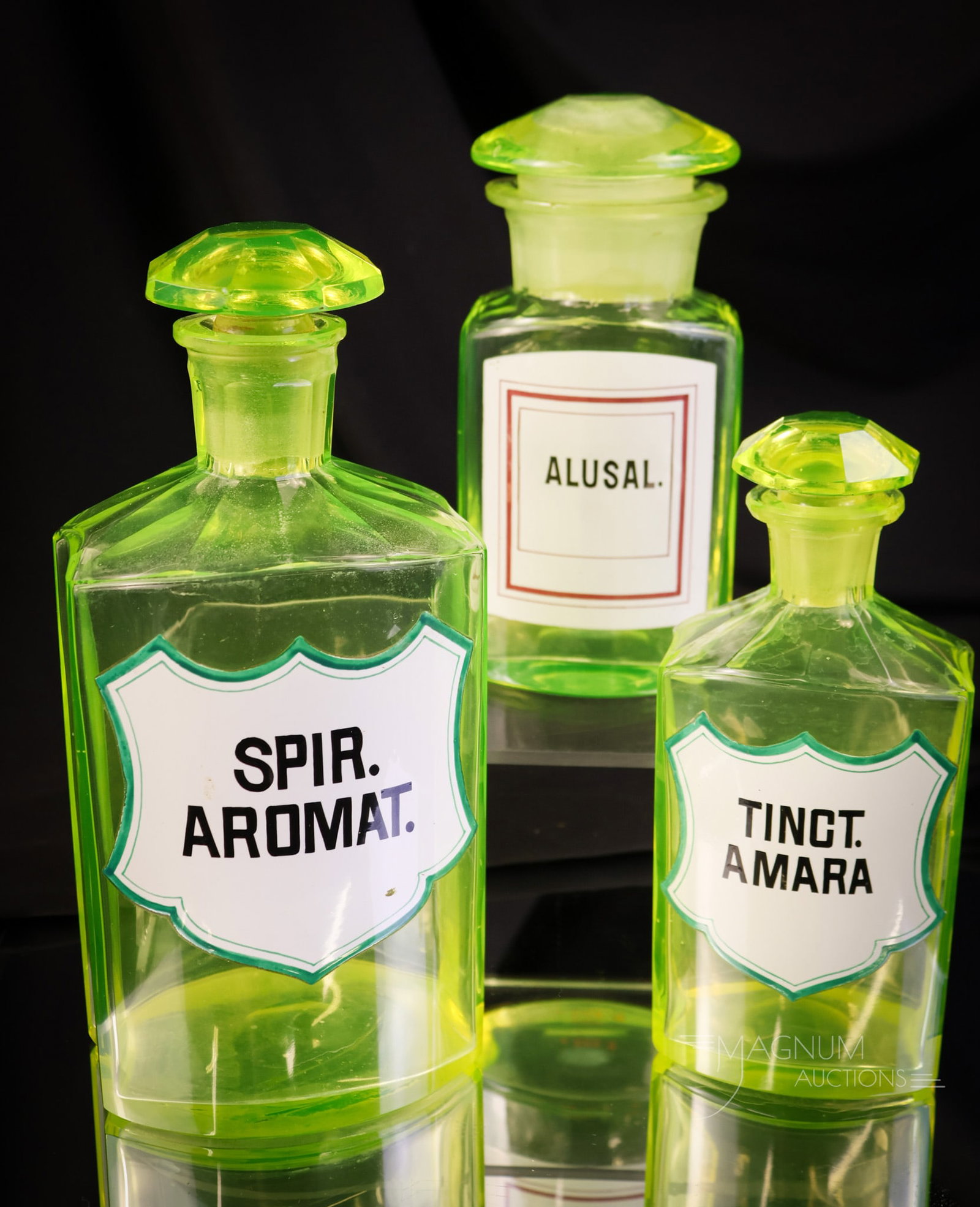 3 pc Lot Antique Victorian Uranium Vaseline Glass Apothecary Bottles Enameled Labels: A select offering of three Victorian uranium vaseline glass enameled apothecary bottles. The tallest measures 8". They are enamel labeled, "Tinct Amara", "Spir Aromat", and "Alusal." Apothecary bottle