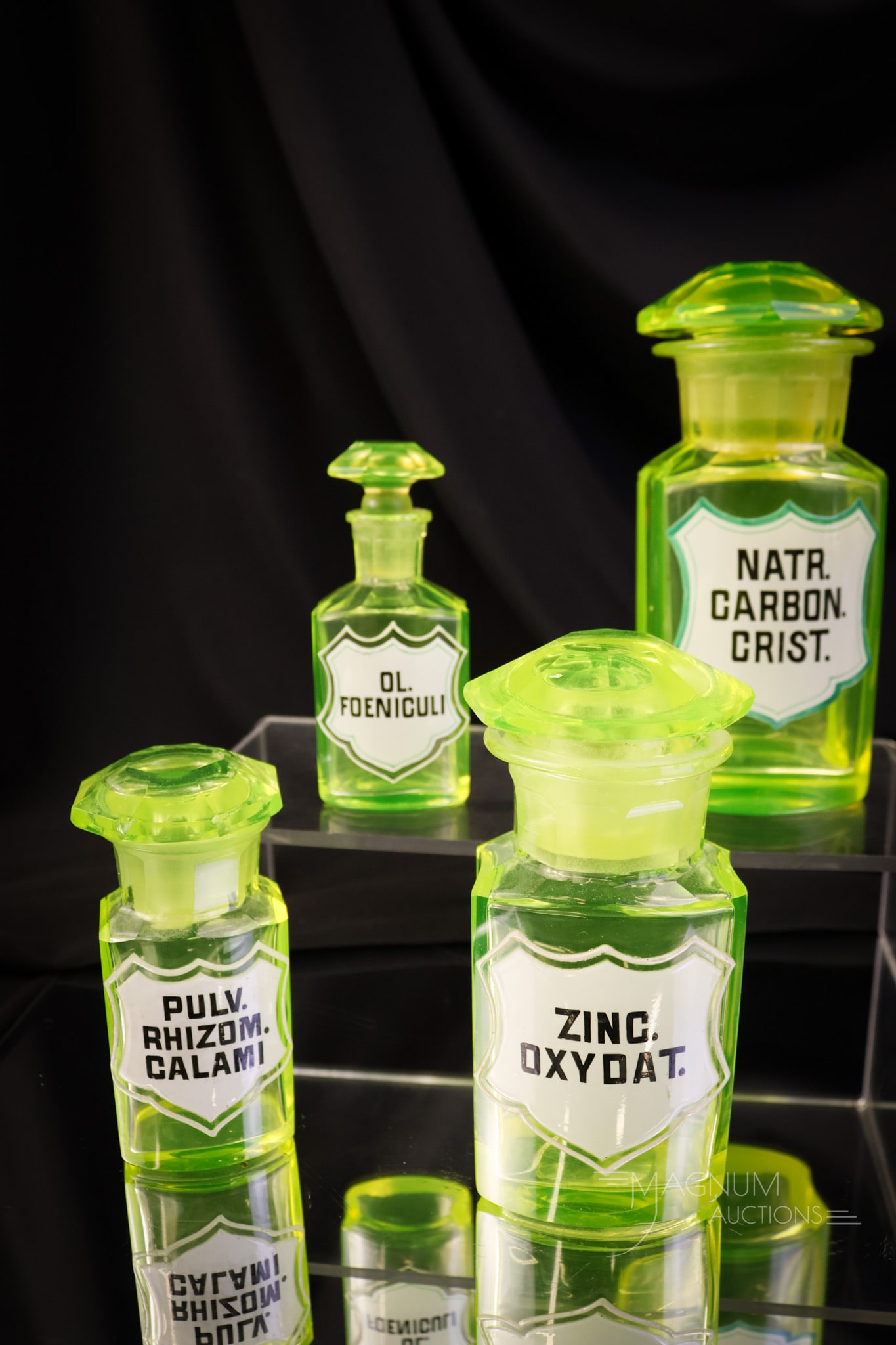 4 pc Lot Antique Victorian Uranium Vaseline Glass Apothecary Bottles Enameled Labels: A select offering of four antique Victorian vaseline uranium glass enameled apothecary bottles. Each is a rare and desirable find. The labels read, "Ol Foeniculi", "Zinc Oxydate", "Natyr Carbon Crist"