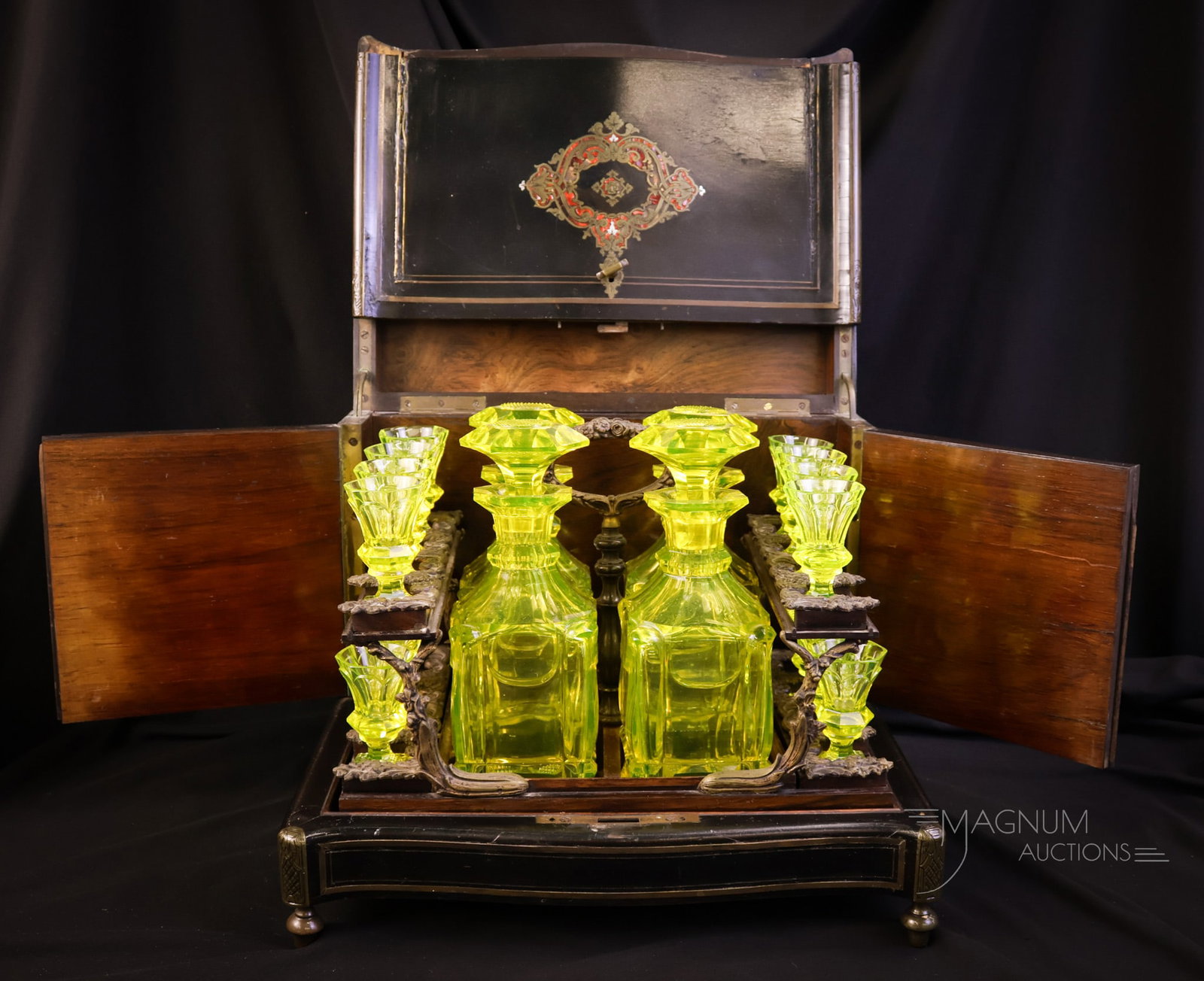 Museum Rarity Early Victorian Boulle Inlayed Case 18 pc Vaseline Uranium Cut Glass Tantalus Set: Another museum rarity for your bidding pleasure. This is an early Victorian Boulle inlaid tantalus case. This case holds a rare and important 18 pc vaseline uranium tantalus bottle set in vaseline ura