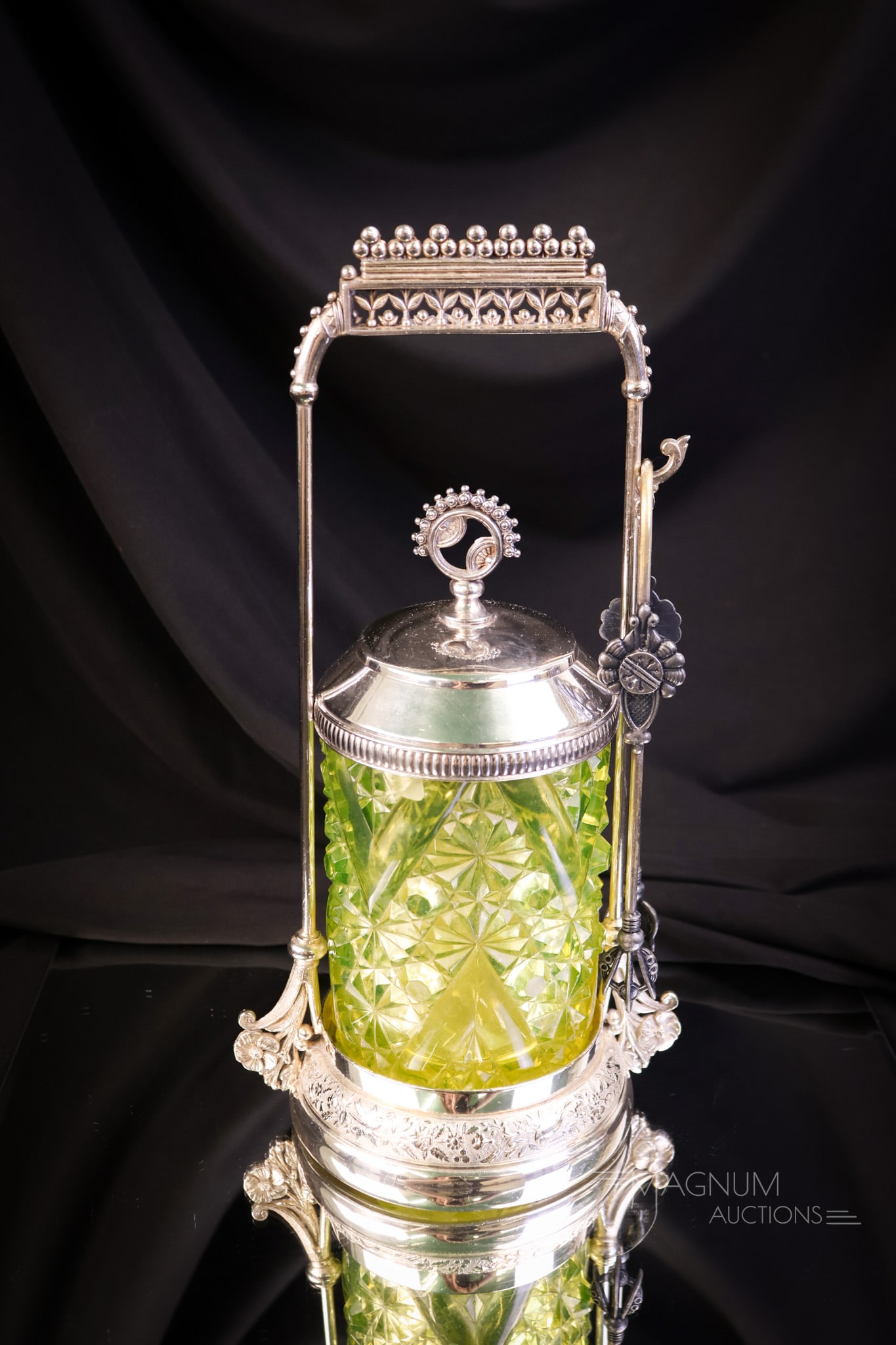 Rogers Victorian Silverplate Vaseline Uranium Daisy & Button w/ V Ornament Pickle Castor: A desirable find in a collectible pattern. This is a Rogers silverplate Victorian pickle castor. The castor is complete with a vaseline uranium-rich jar in the Daisy & Button pattern with "V" ornament