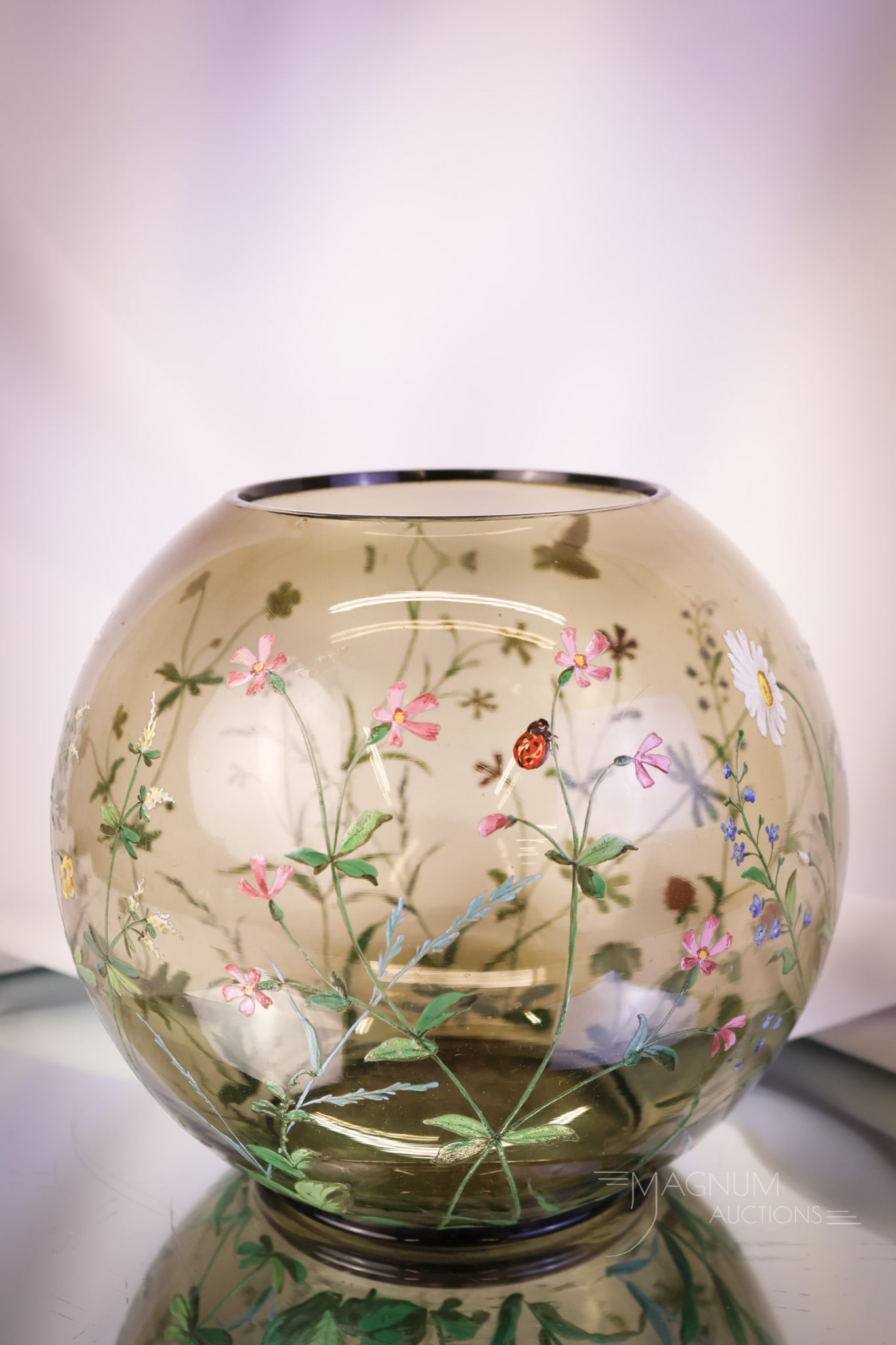 6 1/4" Moser Smoke Spherical Enameled Vessel Rose Bowl: What a nice find this spherical vessel is! This is a Moser smoke colored enamel decorated piece that could be a large rose bowl. This piece is decorated with flowers, a ladybug, and a bee. This piece 