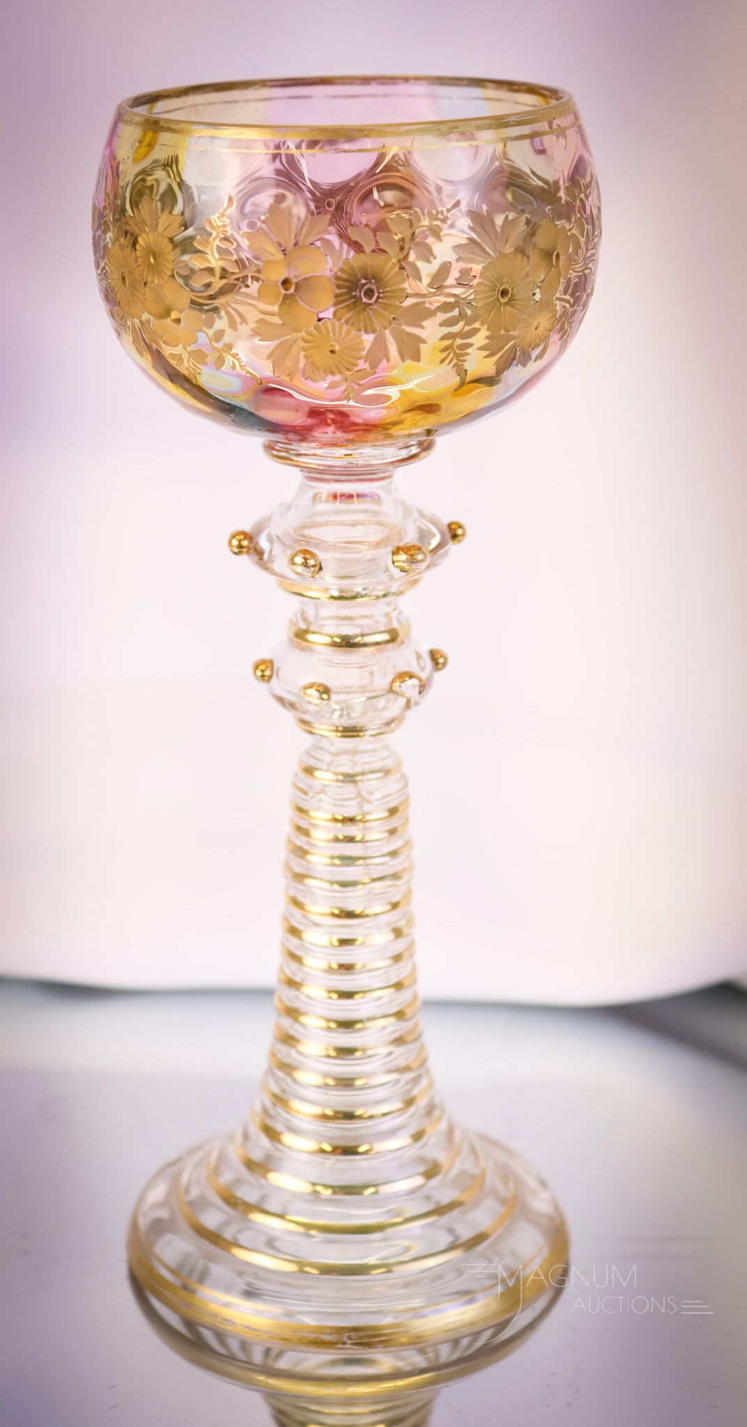 Moser 8" Rainbow Victorian Gilt Enameled Engraved Glass Reomer: An outstanding find in decorated Moser glass. This is a roemer in transparent rainbow glass. This piece measures 8" tall and 3 1/4" wide, It is enamel and gilt decorated and also engraved with a flora