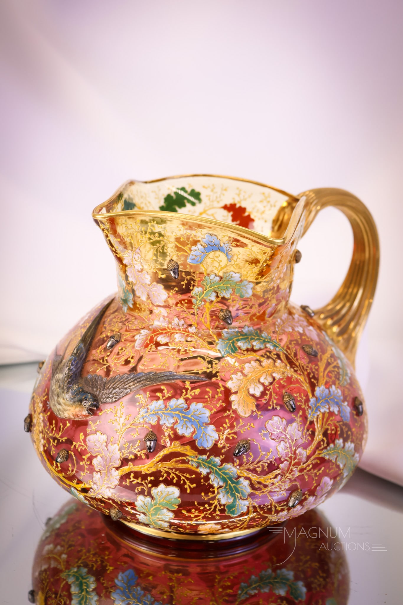 Moser Signed Original Sticker Enamel Acorn Heavy Enamel Bird Gilt Wglass Water Pitcher: Another fantastic find in desirable Victorian Moser glass. This glass pitcher is in amberina. It bears the original sticker and is signed Moser. It has an all-over decoration of enamelled leaves and a