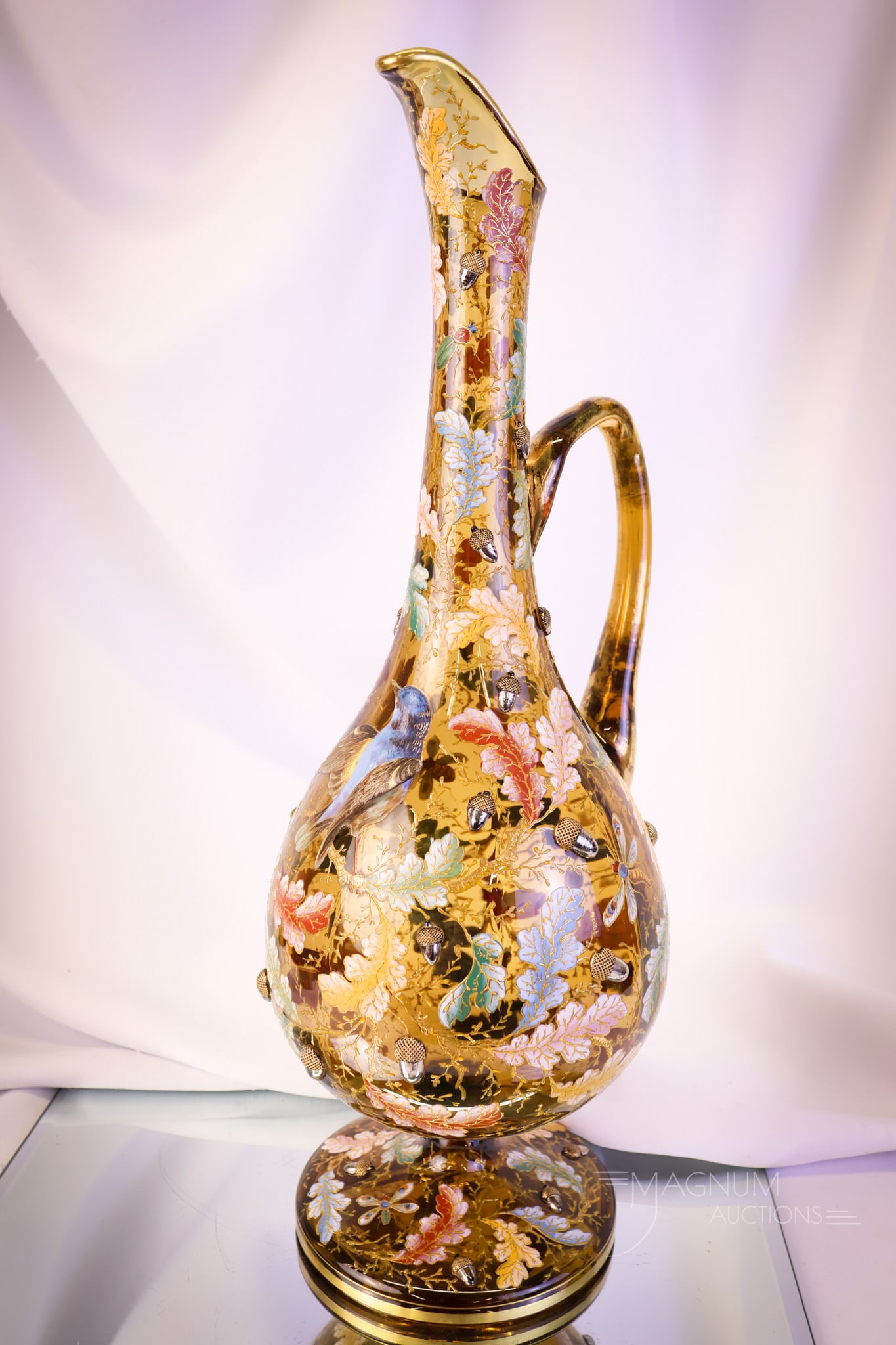 Museum Rarity 17" Monumental Moser Amber Victorian Glass Ewer: Another museum find in our vault of rarities. This is a 17" tall monumental ewer in amber glass. This piece has a heavy, built-up decoration of a bird. In addition, it is decorated with applied acorns
