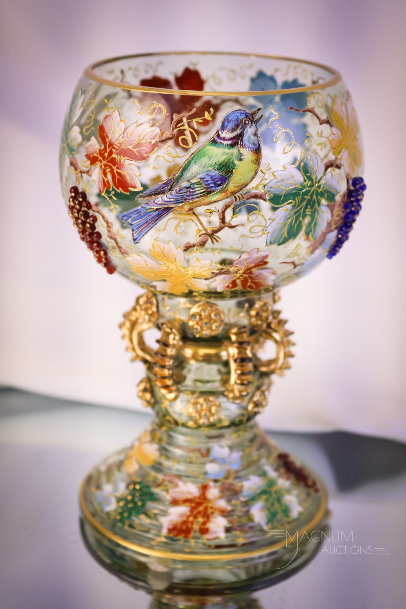 Important Moser Victorian Gilt Enameled Art Glass Leaves & Insects Goblet Roemer: An important find in a piece of Moser glass. This is a goblet or roemer in pale blue glass. This piece is lavishly decorated with enameled leaves and insects. It features a heavy, built-up decoration 