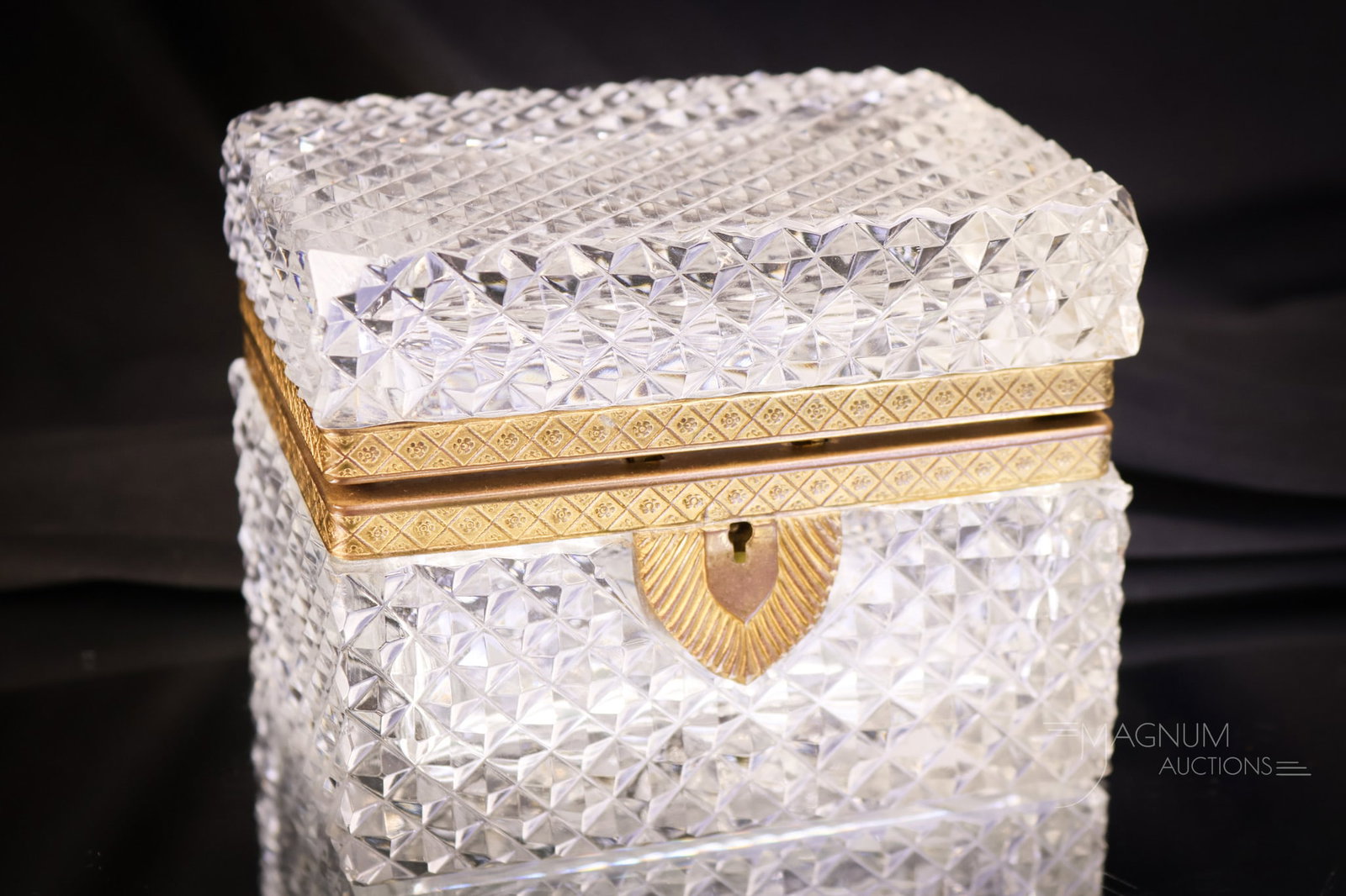 French Cut Crystal Regency Gilt Bronze Jewelry Casket: Another sparkling lovely in our auction. This is a French cut crystal Regnecy gilt bronze jewelry casket. This fine example measures 3 1/2" tall and 4 3/4" wide. SHIPPING NOTICE: If you choose not to 