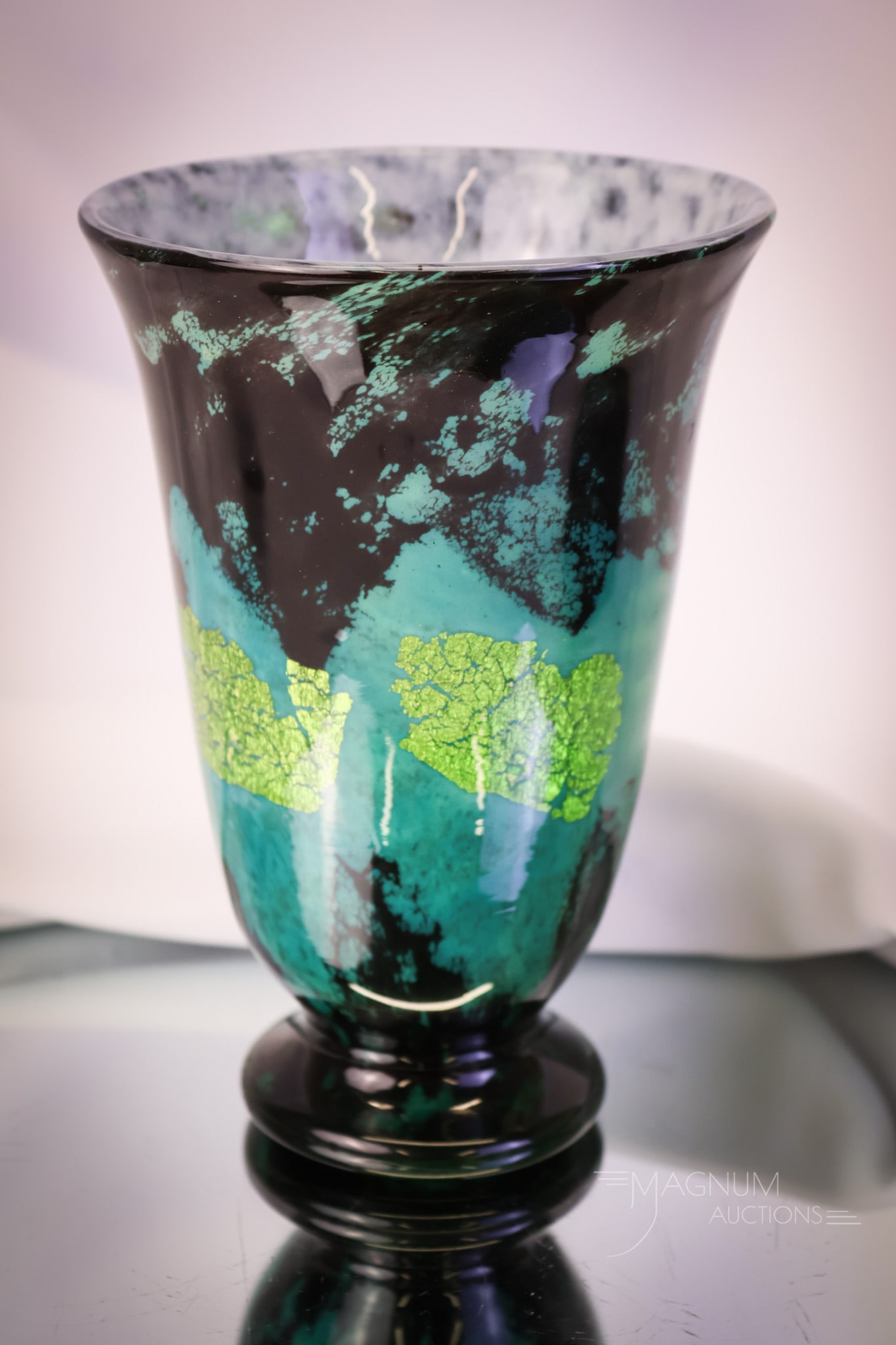 Signed Daum Nancy French Art Deco Antique Glass Vase: A beautiful Art Deco period Daum Nancy art glass vase. This piece has aventurine panels in green and blue on a black cased glass ground. The vase measures 7" tall and 5" wide. SHIPPING NOTICE: If you 