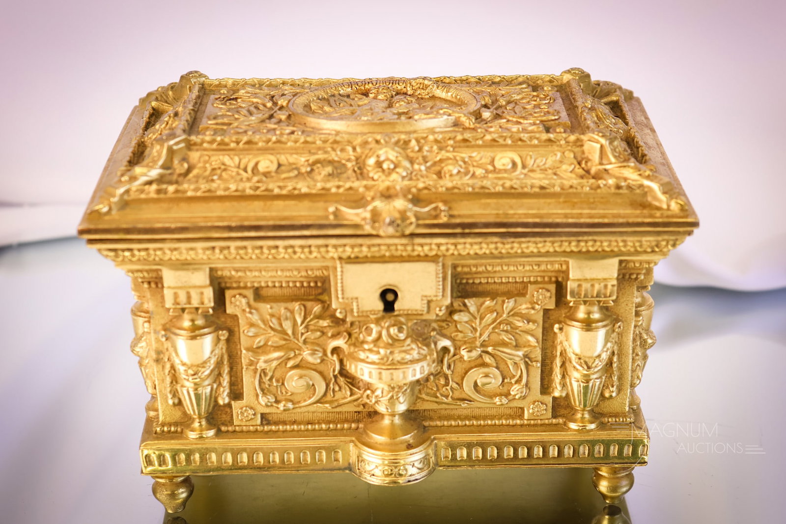 French Renaissance Revival 19th Century Circa 1870 Gilt Bronze Jewelry casket: A fine French Renaissance Revival, circa 1870, 19th-century casket. This piece is in gilt bronze. The piece measures 4 1/4" tall and 6 1/2" wide. SHIPPING NOTICE: If you choose not to utilize the Live