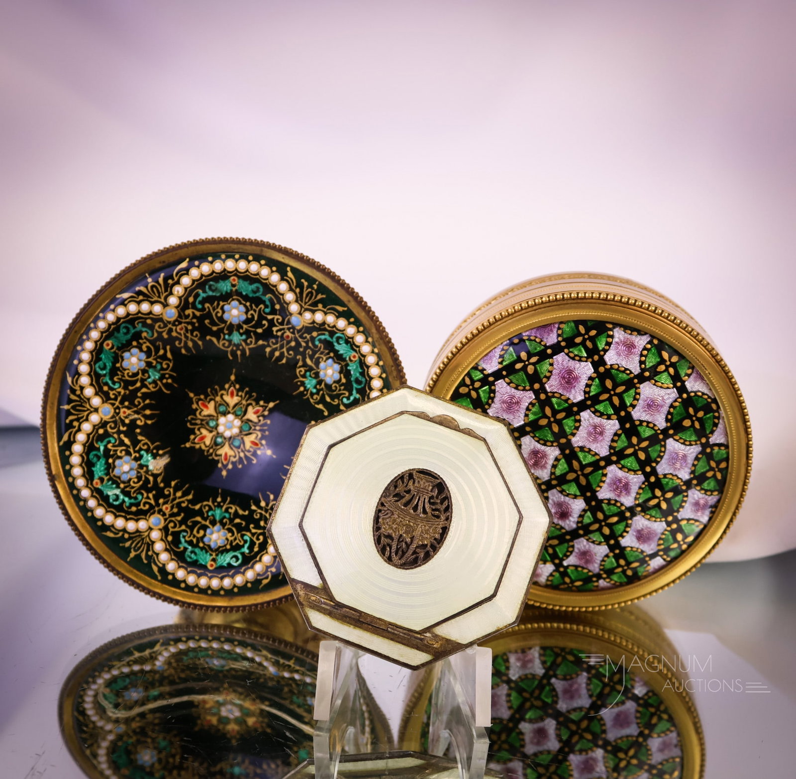 3 pc Lot Enamel Gilt Bronze Sterling Silver Fineries: A wonderful assortment for your bidding pleasure. This lot includes a gilt bronze and enamel miniature tazza in emerald green with flowers. The second delight is a gilt bronze round box with green, pu