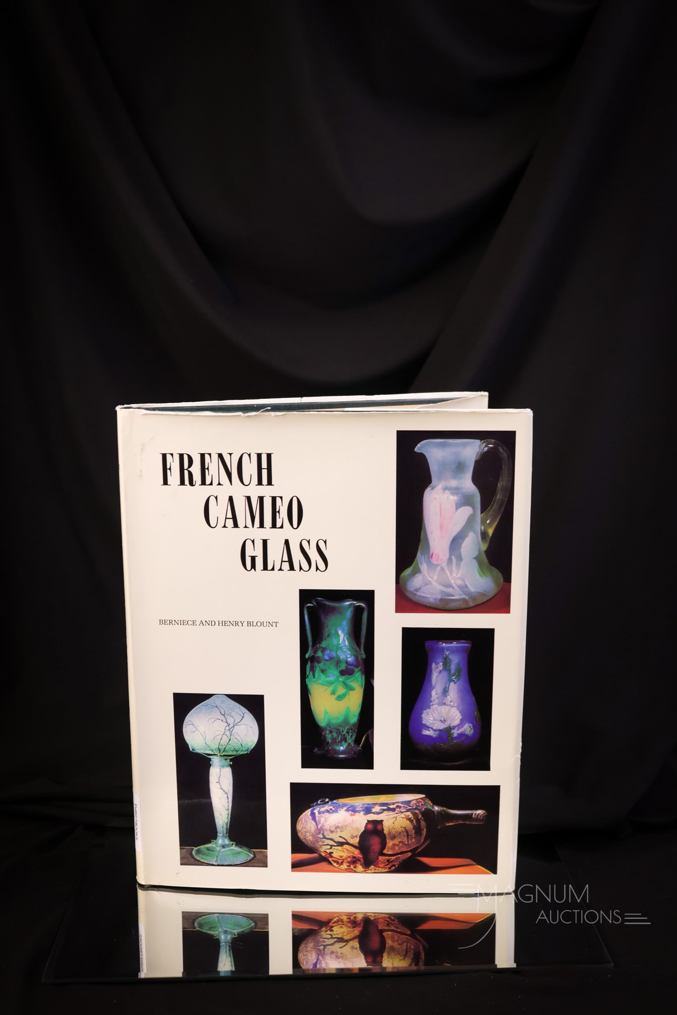 Book, "French Cameo Glass" by Berniece and Henry Bount: An almost pristine example of the book, "French Cameo Glass" by Berniece and Henry Blount. This book measures 11" by 9" SHIPPING NOTICE: If you choose not to utilize the LiveAuctioneers LiveShip progr