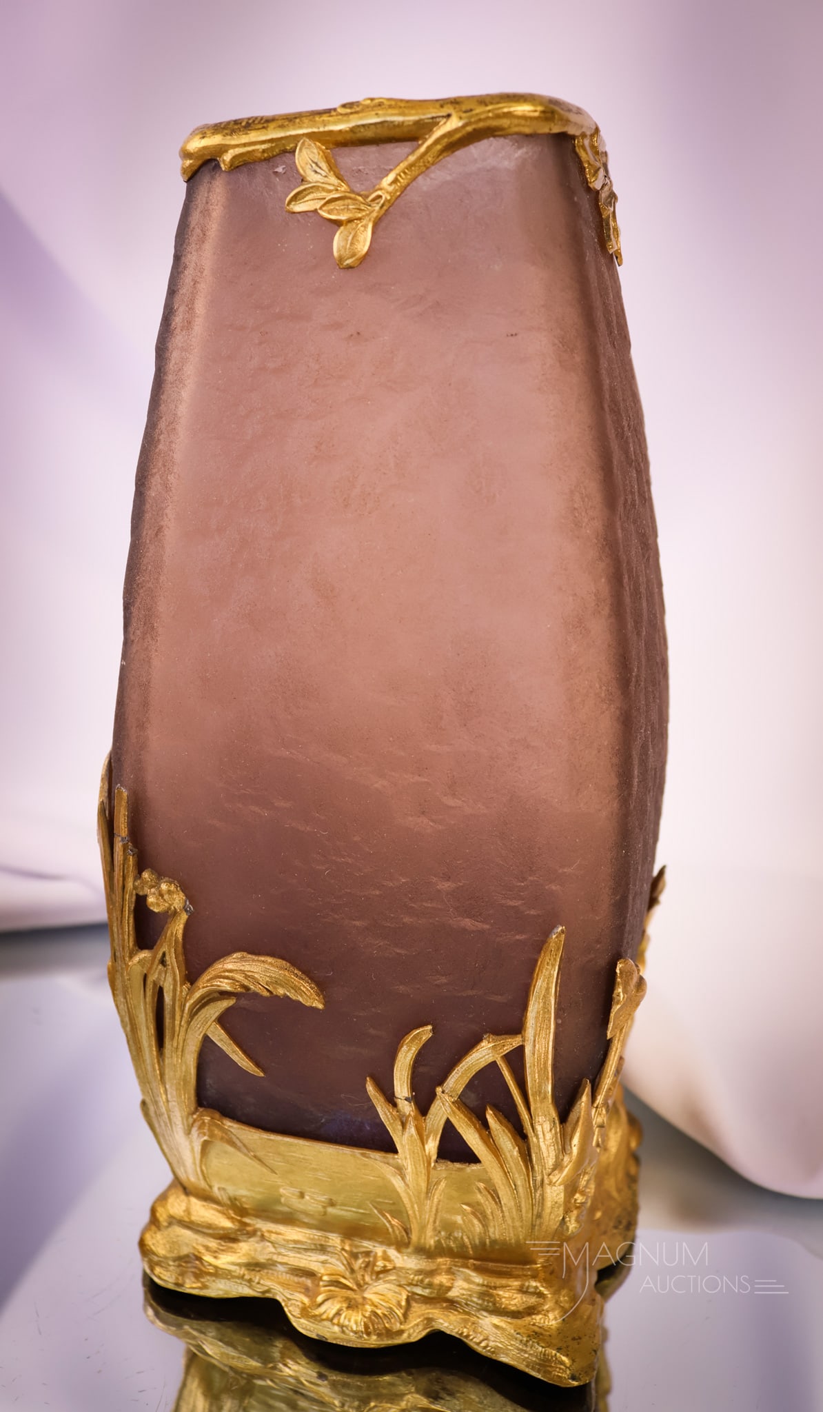French Acid Etched Cameo Gilt Bronze Glass Vase Mt. Joye Legras: A very nice French acid-etched cameo art glass vase set in a gilt bronze holder. This piece is attributed to Legras or Mt. Joye. The glass is a deep mocha brown umber color. The gilt bronze metal fram