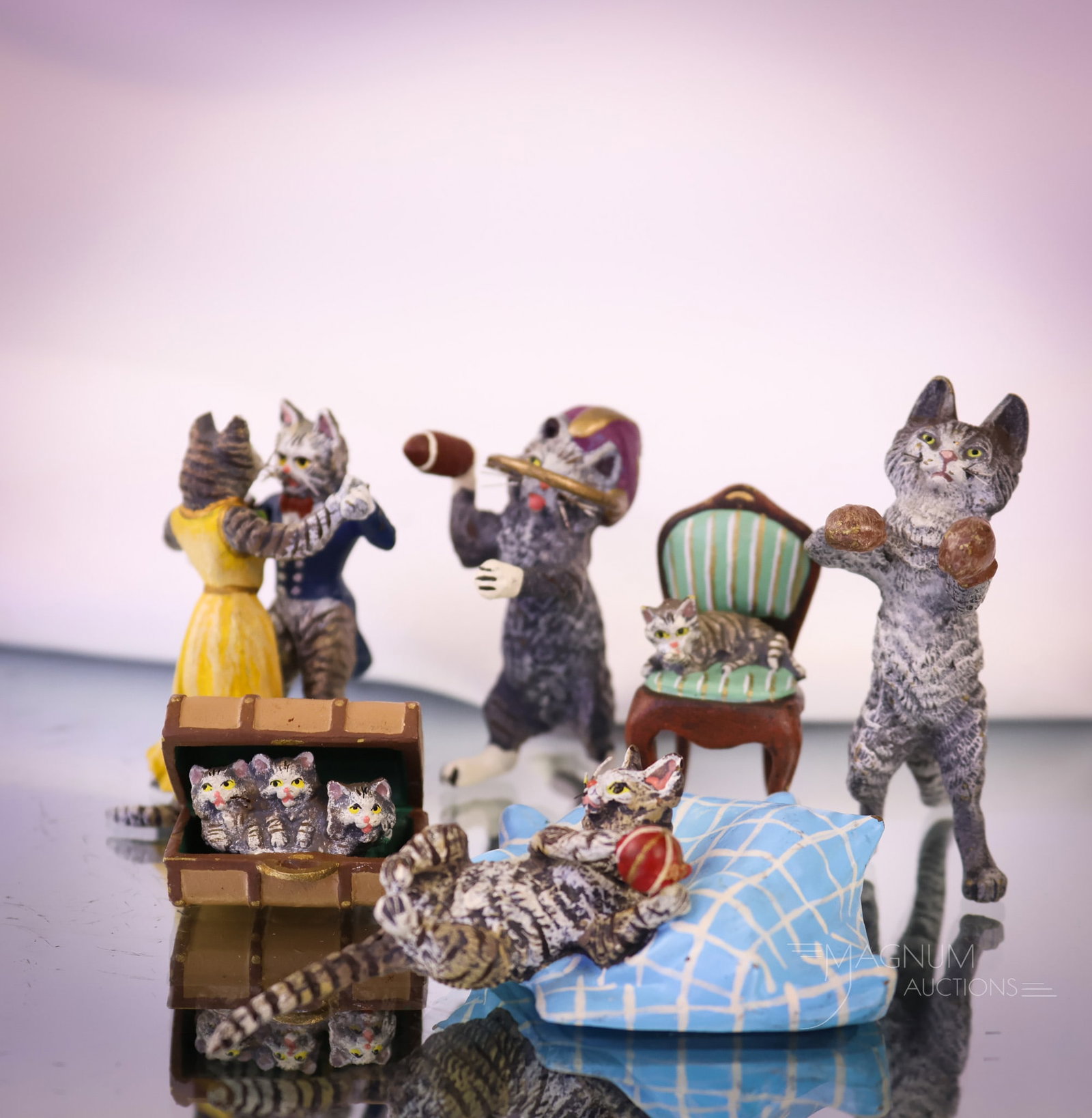 6 pc Lot Cold Bainted Bronze Miniature Feline Figurines: Six delightful cold-painted bronze feline figurines. These are in various forms and activities. There is a boxer, a football player, dancers, and more. The tallest measures 2". SHIPPING NOTICE: If you