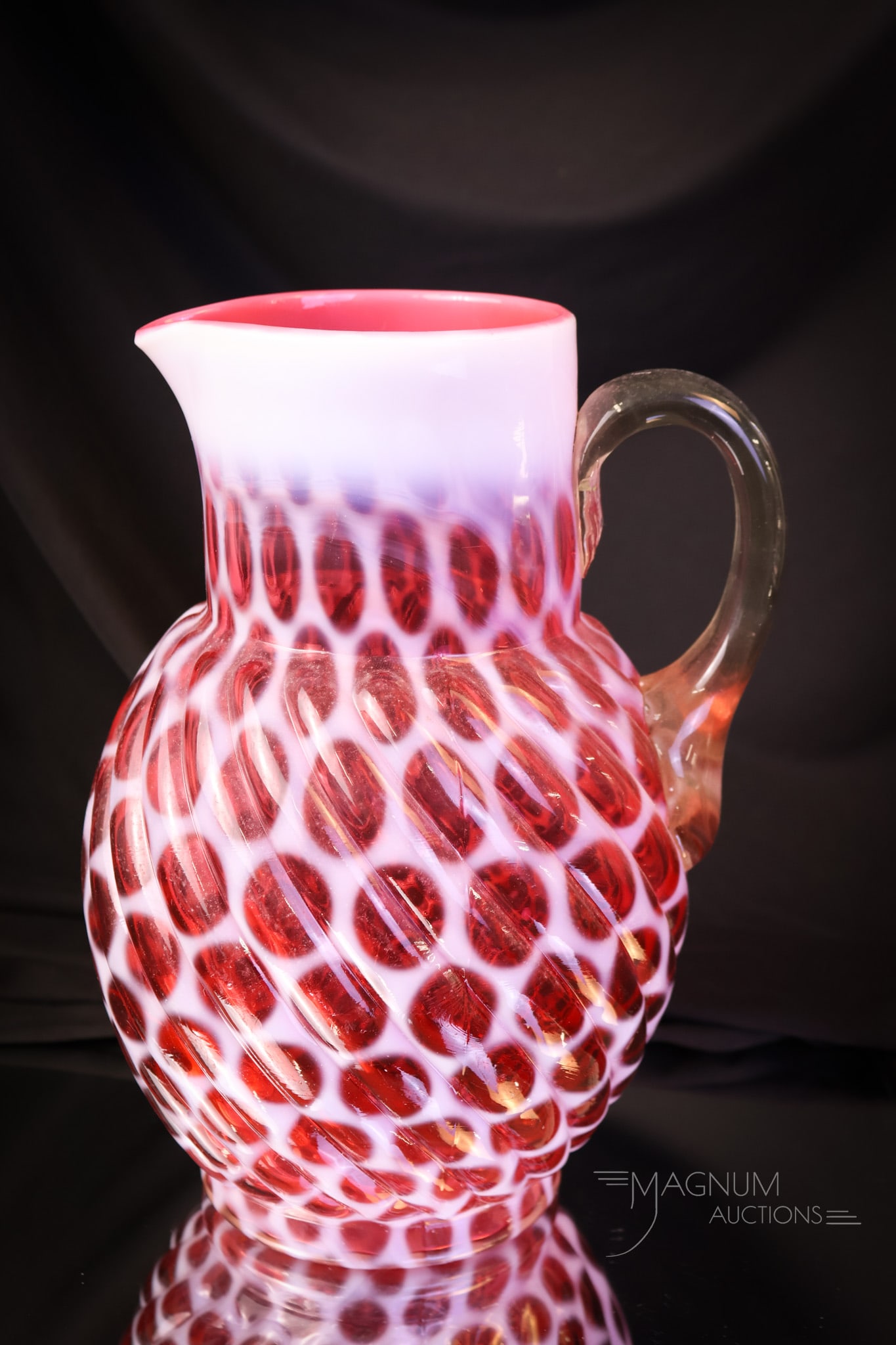 Scarce Cranberry Opalescent Big Windows Swirled Victorian Water Pitcher: A scarce find in our Victorian opalescent glass. This is a Big Windows Swirled example. It is a rich cranberry coloring and bright white opal. A must-have piece for any opal collection. The pitcher me