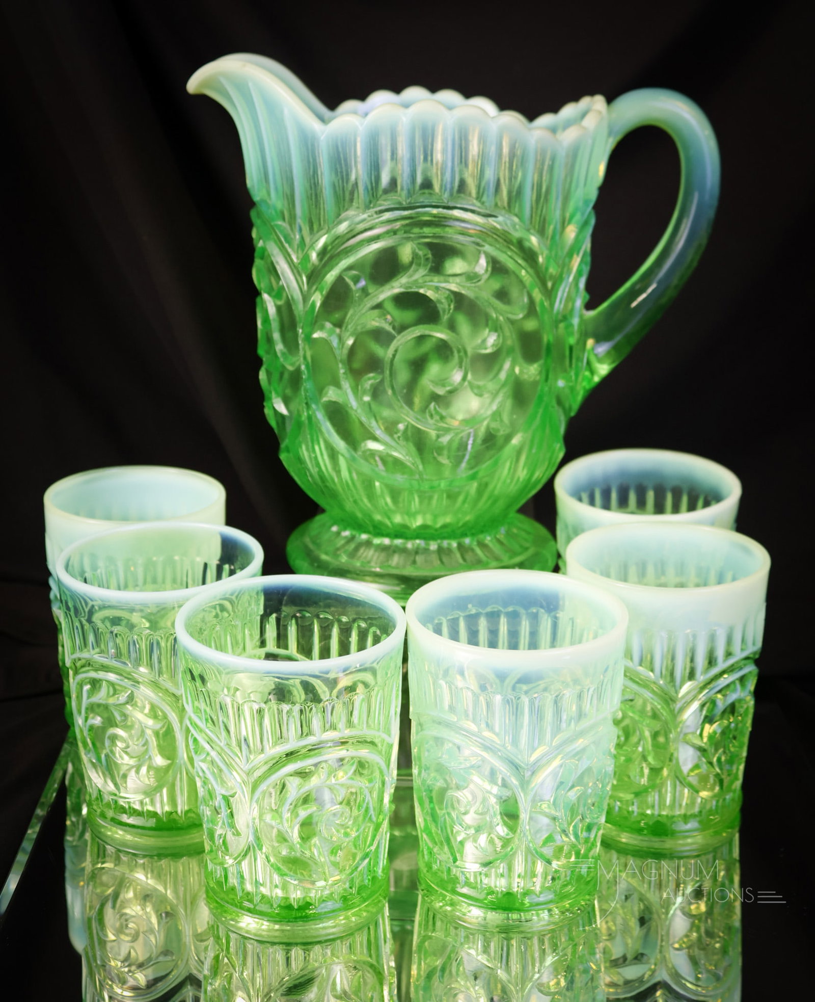 7 pc Dugan Uranium Green Opalescent Glass Victorian Water Set: Here's a beautiful Dugan glass uranium-rich Victorian water set. The set consists of a pitcher and six tumblers. The entire set glows brightly under black light. The tallest measures 8 1/4" tall. SHIP