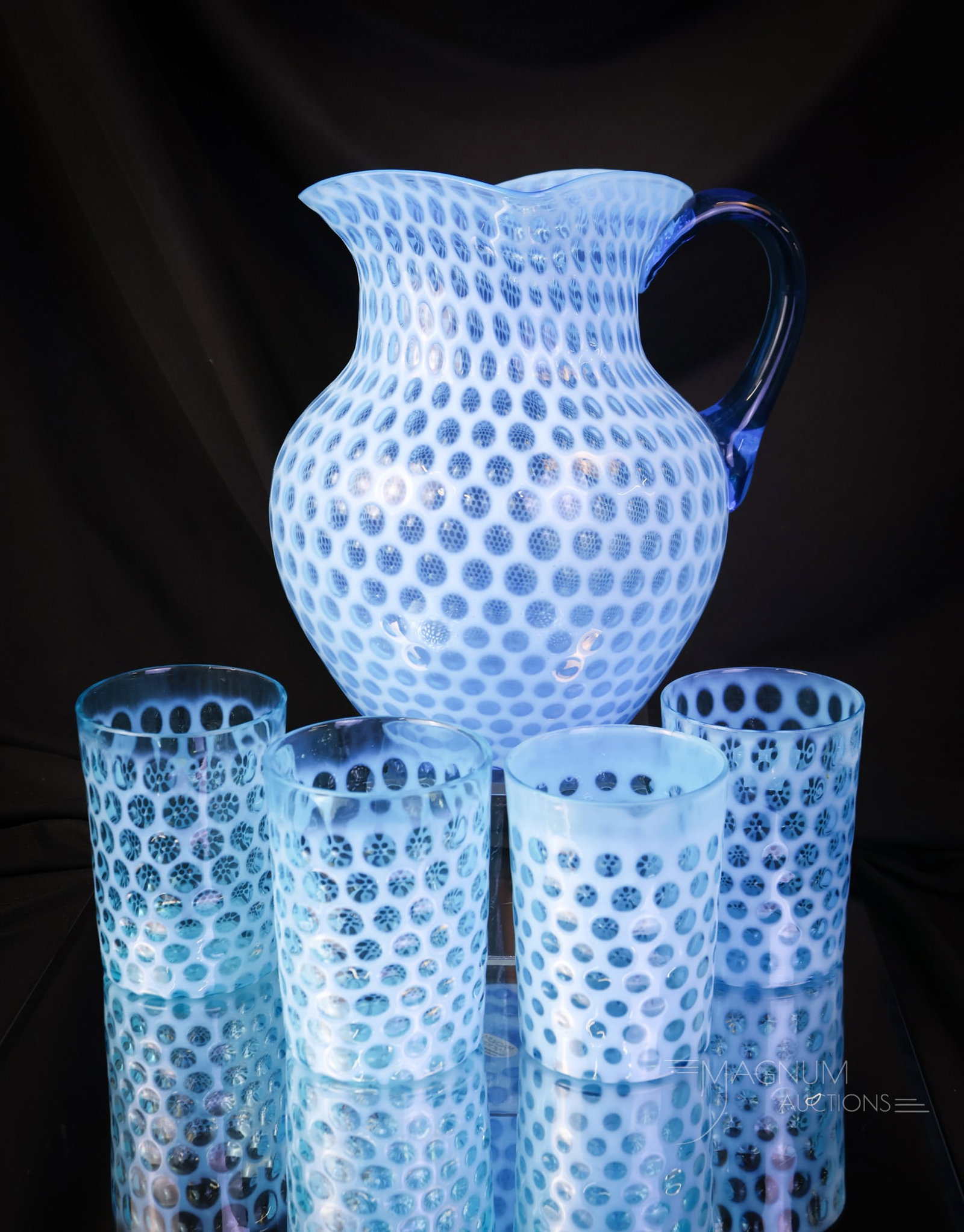 Hobbs 5 pc Blue Opalescent Windows Victorian Water Set: A clearly striking Victorian blue opalescent five-piece water set. This set was made by Hobbs. The set features brilliant blue coloring and bright opalescence. The tallest of the set measures 8 1/4". 