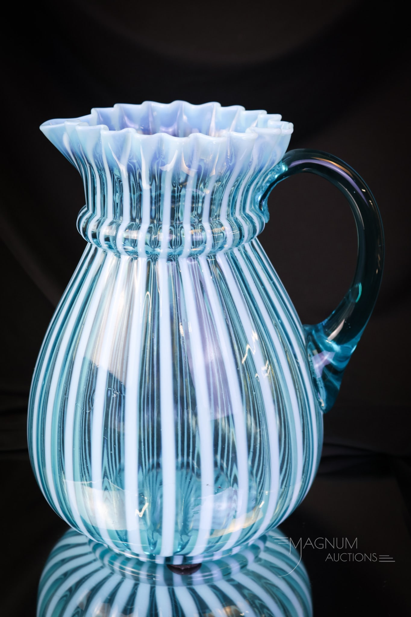 Scarce Northwood Blue Opalescent Victorian Glass Stripe Water Pitcher: A scarce find in Victorian opalescent water pitchers. You will see two to three cranberry examples for every blue example of this Ring Neck Stripe pattern pitcher. This one has the best color and opal