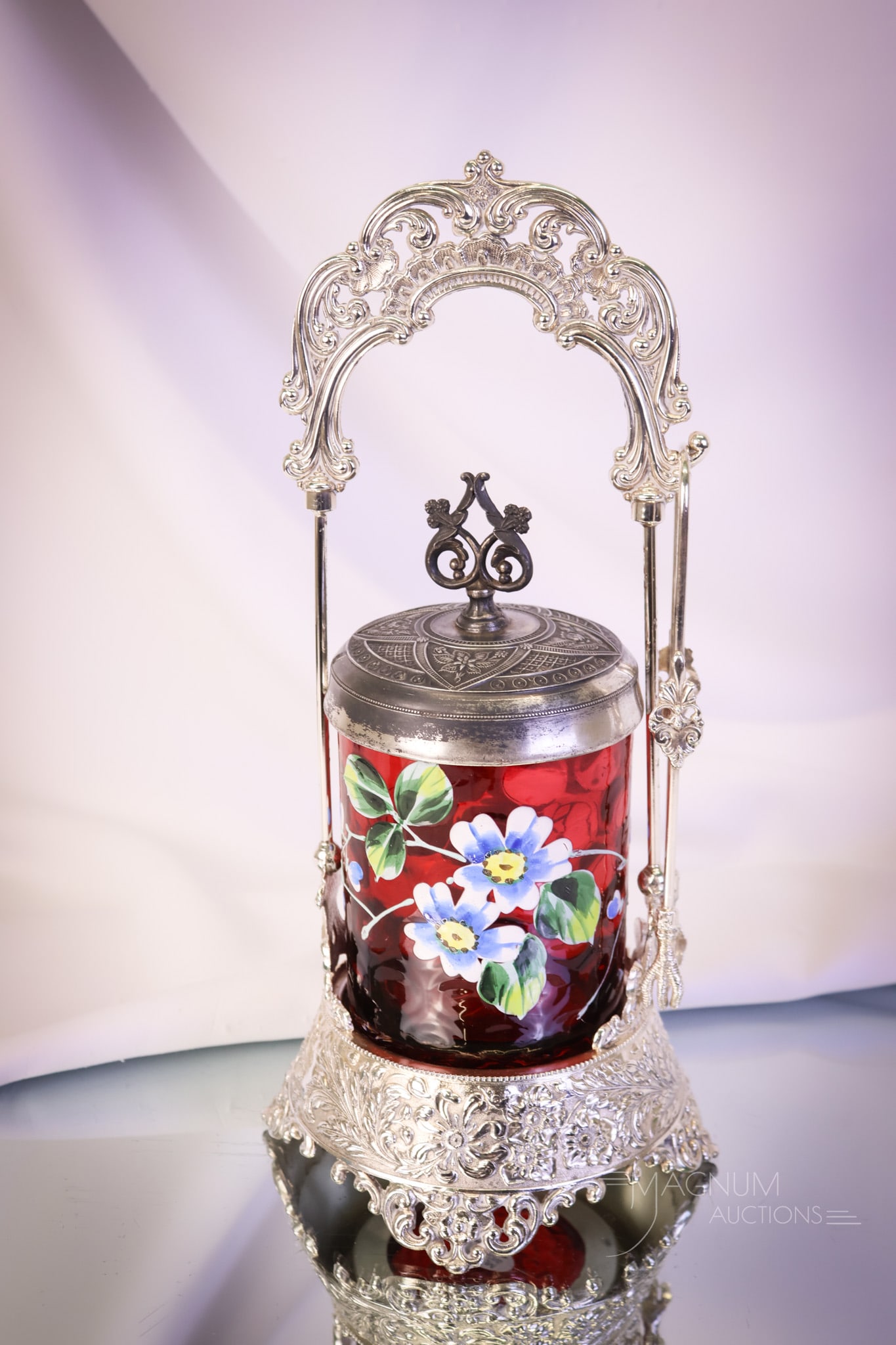 Eagle Silverplate Victorian Cranberry Enameled Pickle Castor: A beautiful find in a Victorian pickle castor. This one has a cranberry enameled glass jar set in a marked Eagle silverplate frame. So lovely! It just makes you have a hankering for pickles. The casto