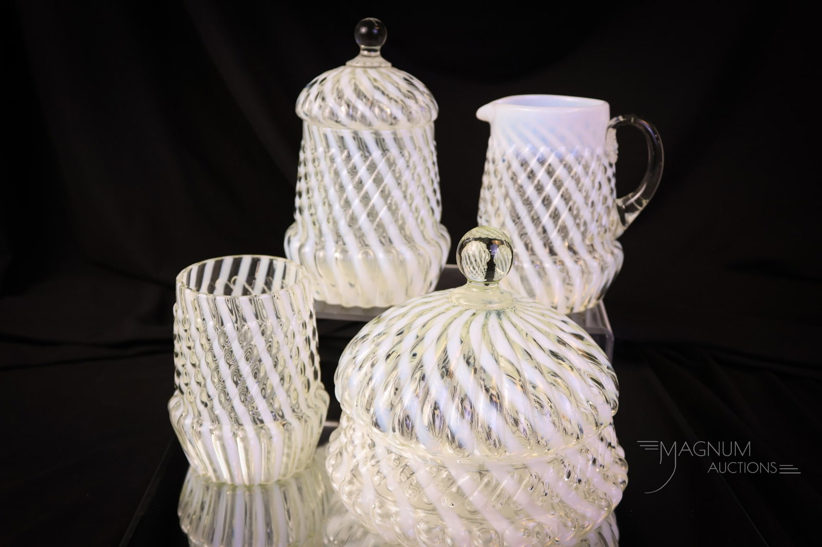Northwood Crystal Opalescent Chrysanthemum Base Swirl Table Set: A seldom seen set for all of you Northwood collectors out there! This is a four-piece table set in the Northwood Chrysanthemum Base Swirl pattern. A very attractive and seldom seen set! The tallest of