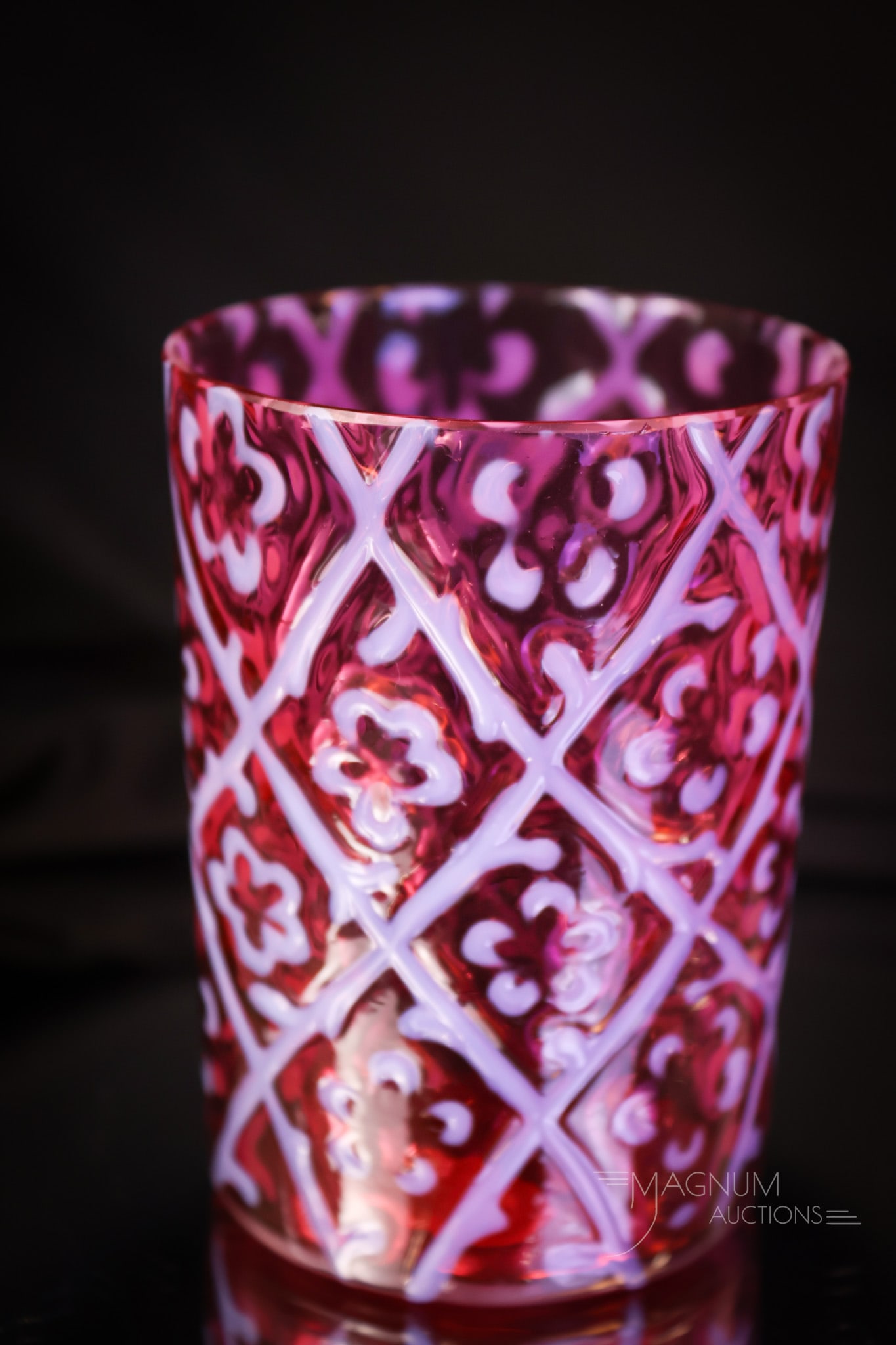Victorian Cranberry Opalescent daisy in Criss-Cross Glass Tumbler: A seldom-found piece. This is a tumbler from the Victorian era in cranberry opalescent glass and in the Daisy in Criss-Cross pattern. The tumbler measures 3 3/4" tall. SHIPPING NOTICE: If you choose n