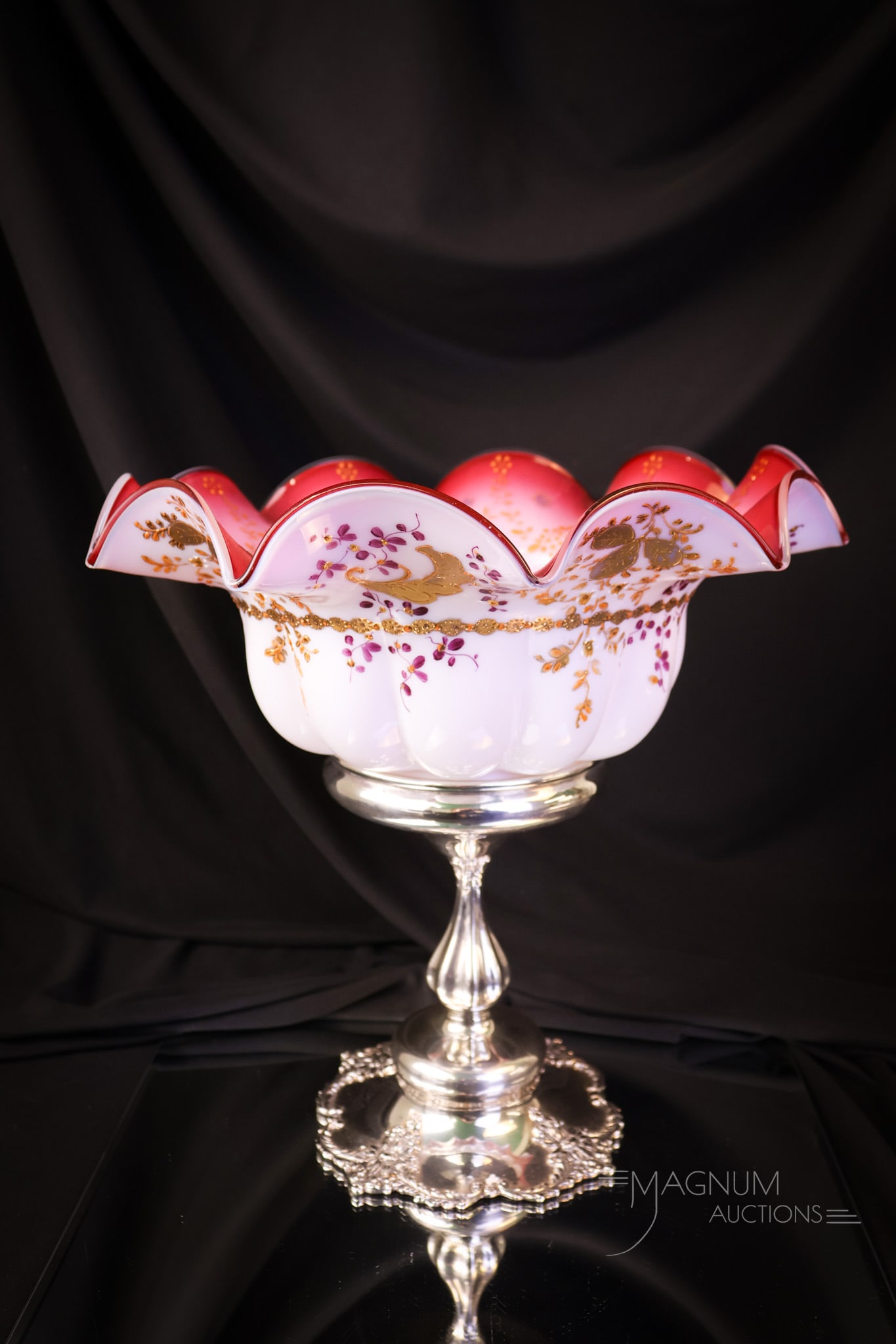 Homan Silverplate Victorian uranium Peachblow Brides Bowl Centerpiece: A fabulous Victorian marked Homan Silverplate Victorian pedestal brides' bowl centerpiece. The bowl is rich in uranium content and glows brightly under black light. The glass is peachblow and is ename