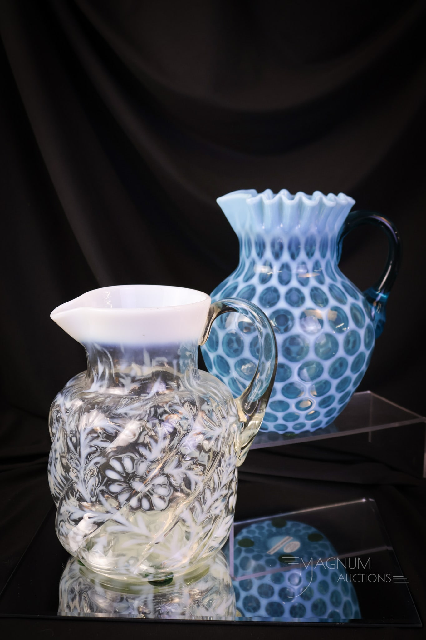 2 pc Lot Northwood Opalescent Victorian Glass Water Pitchers: Two distinct finds in Victorian glass water pitchers. The first is a blue opalescent Honeycomb pattern. The second is a crystal opalescent Daisy & Fern pattern example in the Pzarian Swirl mold. Both 
