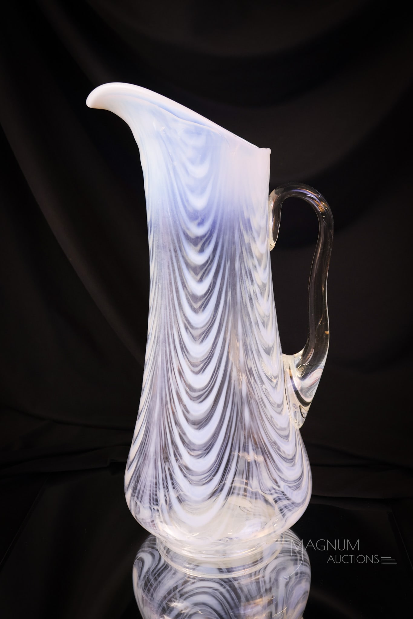 Northwood Opalescent Drape Victorian Glass Tankard Pitcher: A wonderful find in Victorian opalescent glass. This is the Drape pattern tankard pitcher in crystal opal. Not many around we dare say! This one measures 13" tall and has the best opal! SHIPPING NOTIC
