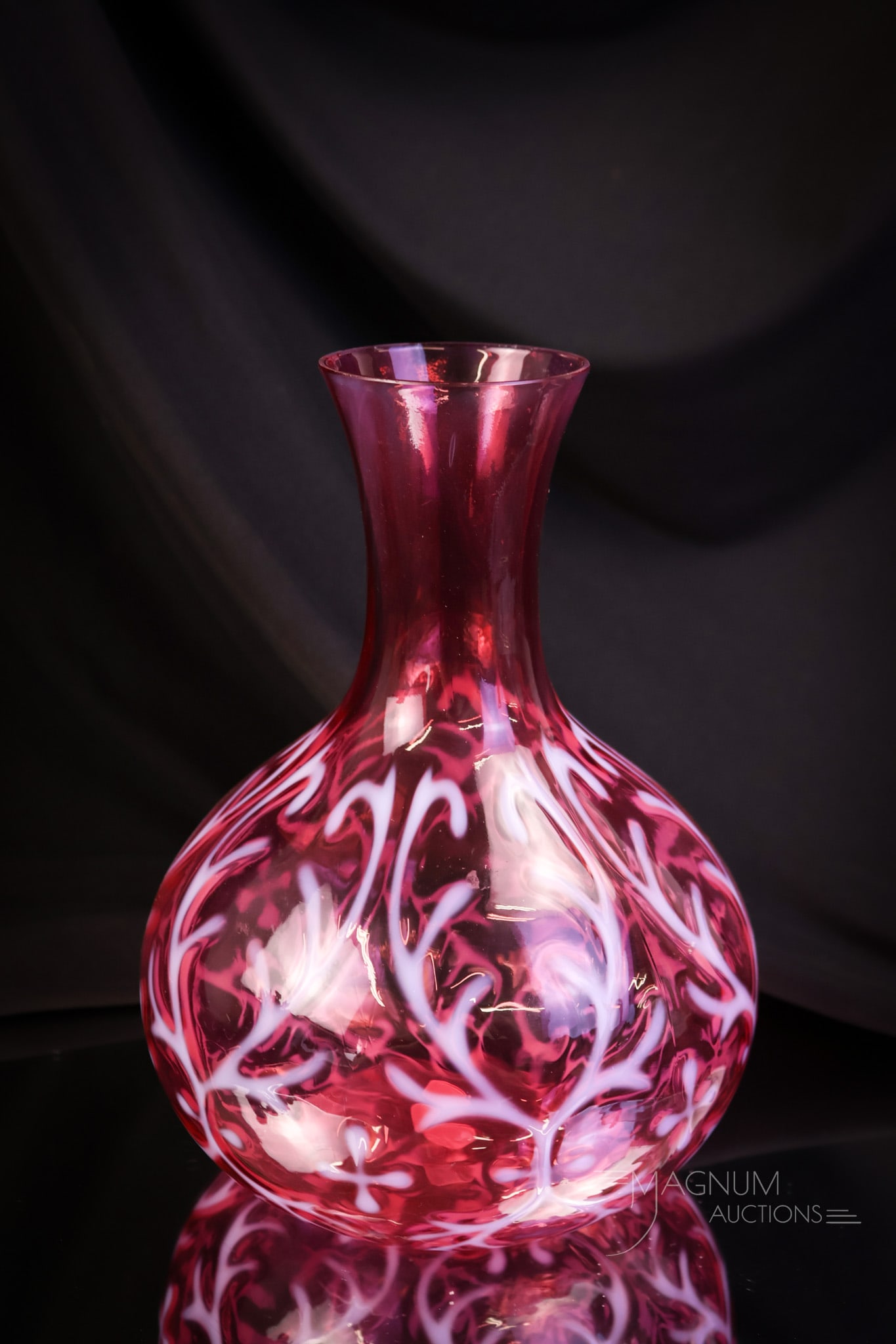 Rare Northwood Cranberry Opalescent Spanish Lace Victorian Water Carafe: A rare find in cranberry opalescent Northwood glass. This is a water carafe in the Spanish lace pattern. This sinuous piece has curvaceous lines and is seldom seen. The carafe measures 8" tall and 5 1