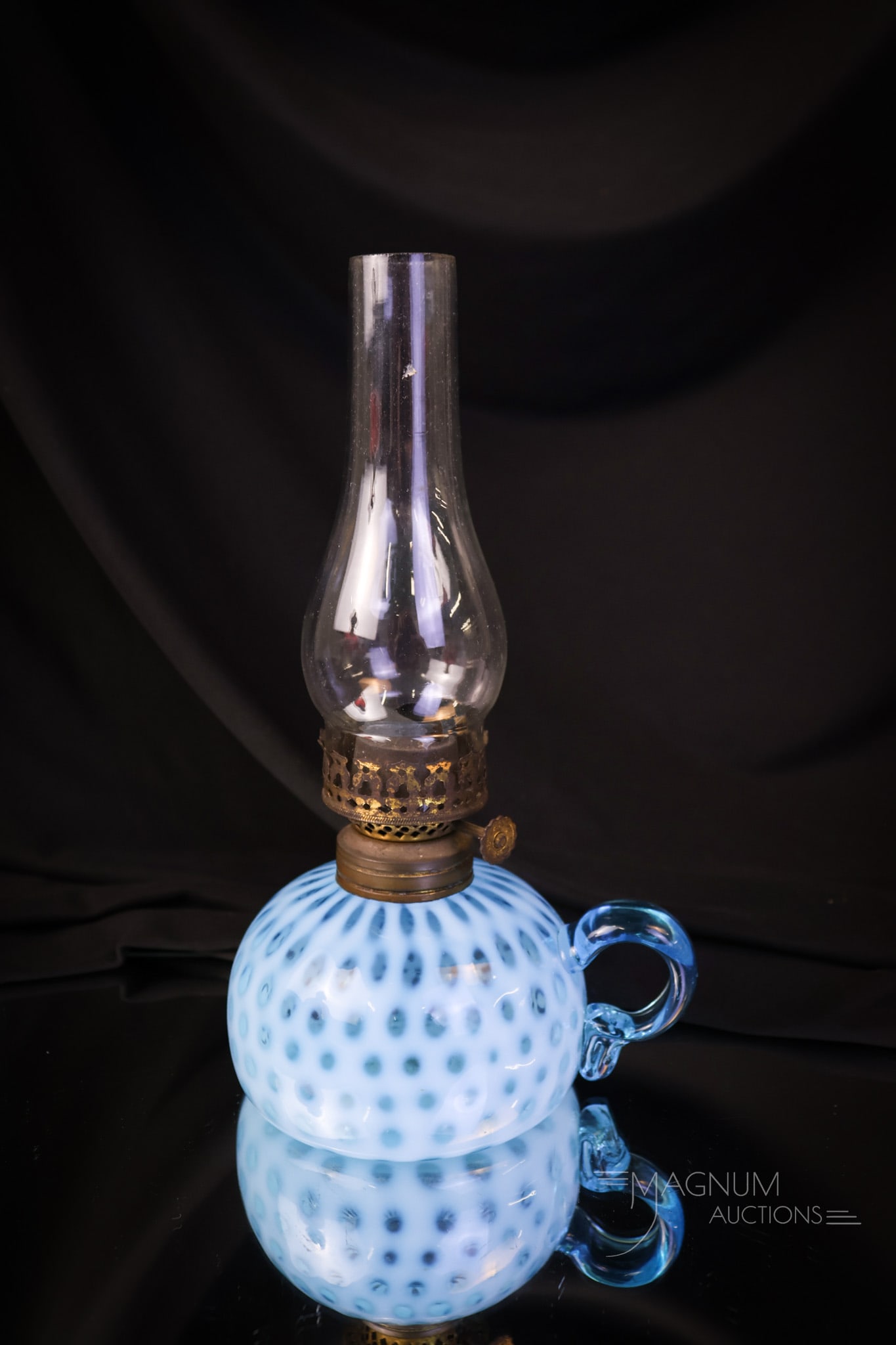 Hobbs Blue Opalescent Windows Victorian Fingered Oil Lamp: Great color and so nice opal is found on this fingered oil lamp in the Windows pattern by Hobbs. This lamp measures 2" tall and 5" wide. SHIPPING NOTICE: If you choose not to utilize the LiveAuctionee
