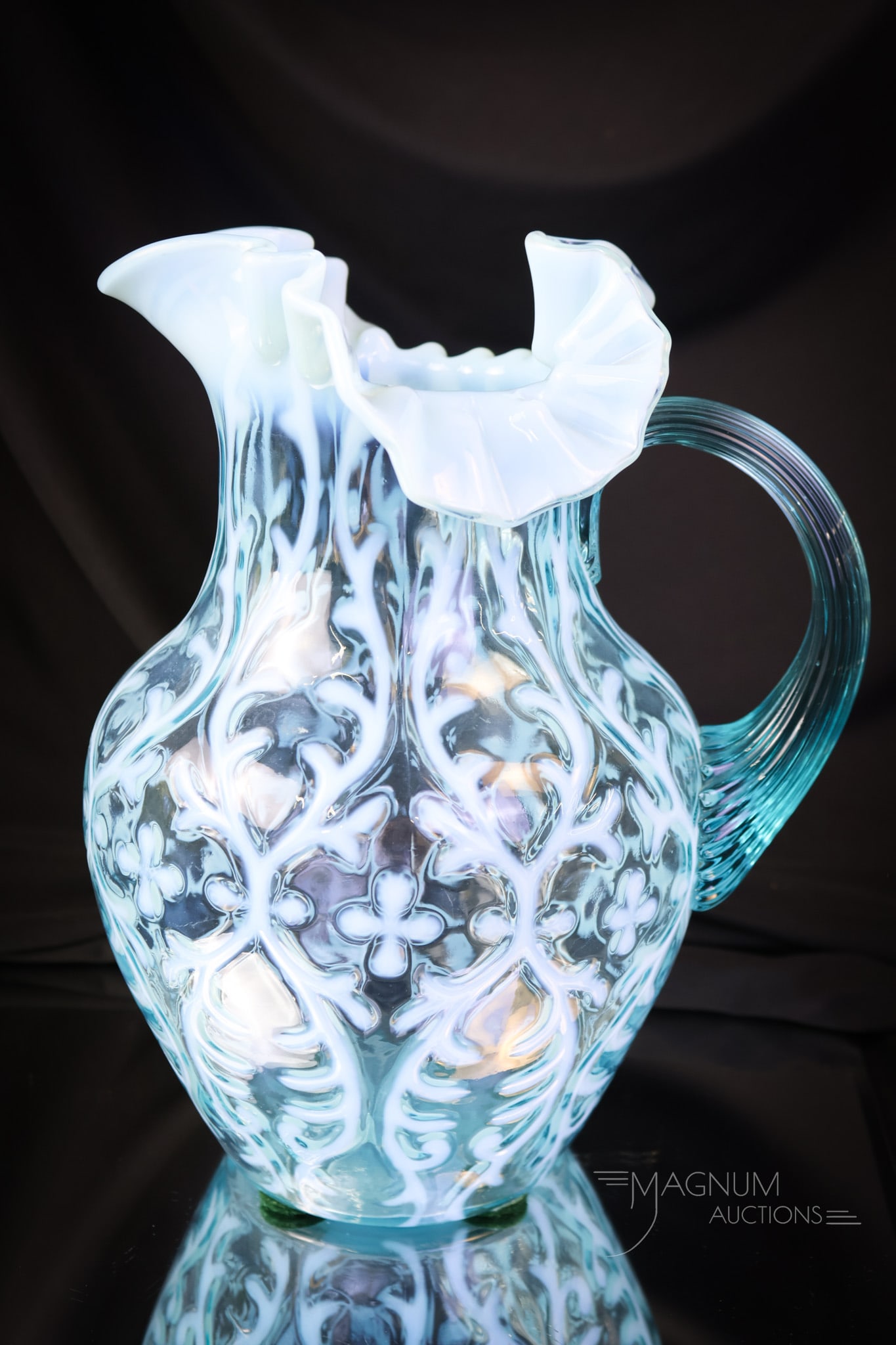 Northwood Blue Opalescent Victorian Spanish Lace Water Pitcher: A super example of a Victorian classic in water pitchers. This is a blue opal example of the Northwood Spanish Lace pattern in the shoulder mold. Nice opal and coloring make this a collection must-hav