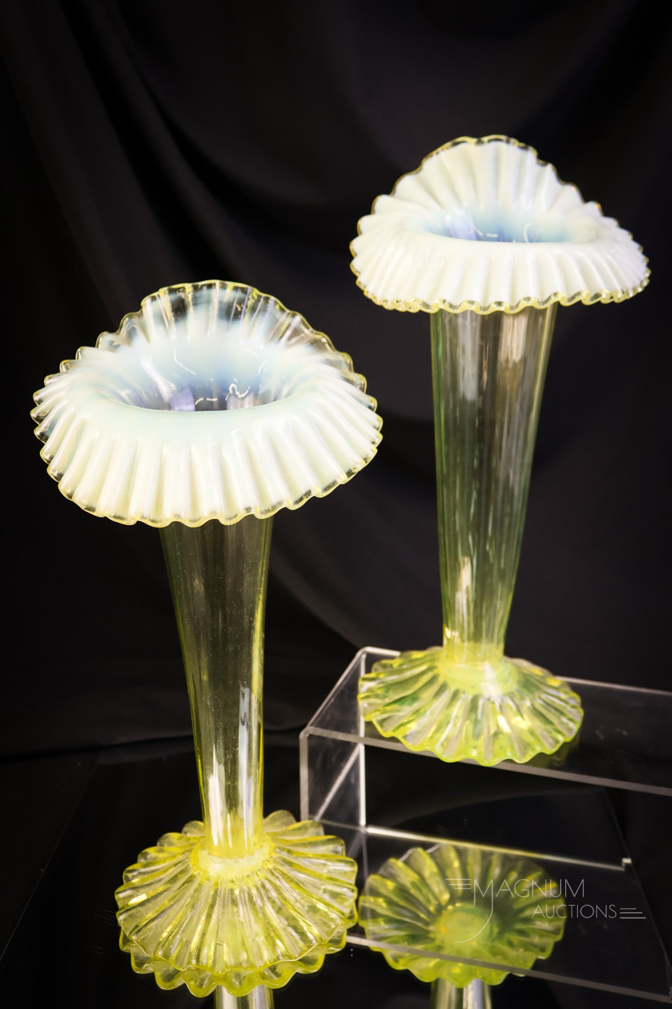 Pair 11" Victorian Vaseline Opalescent Art Glass Jack in the Pulpit Vases: A wonderful find in vaseline uranium glass. This is a pair of Victorian glass jack-in-the-pulpit form mantle vases. Each vase glows brightly with its uranium content. Each vase features a ruffled top 