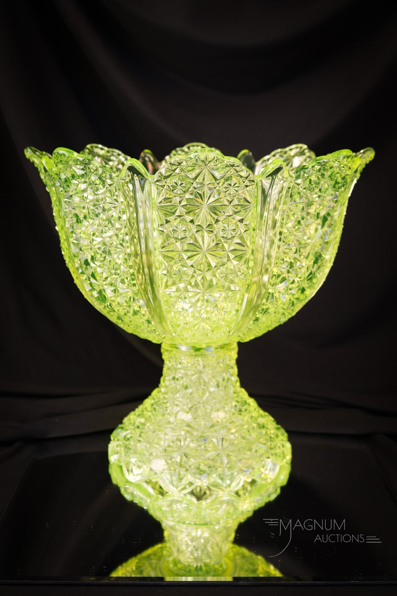 Duncan Ellrose Vaseline Uranium Victorian Glass footed Punch Bowl: A striking and seldom found Victorian Duncan glass Ellrose pattern punch bowl. This super piece measures 10 1/2" tall and 11" wide of glowing vaseline uranium-rich glass beauty. Will you be the lucky 