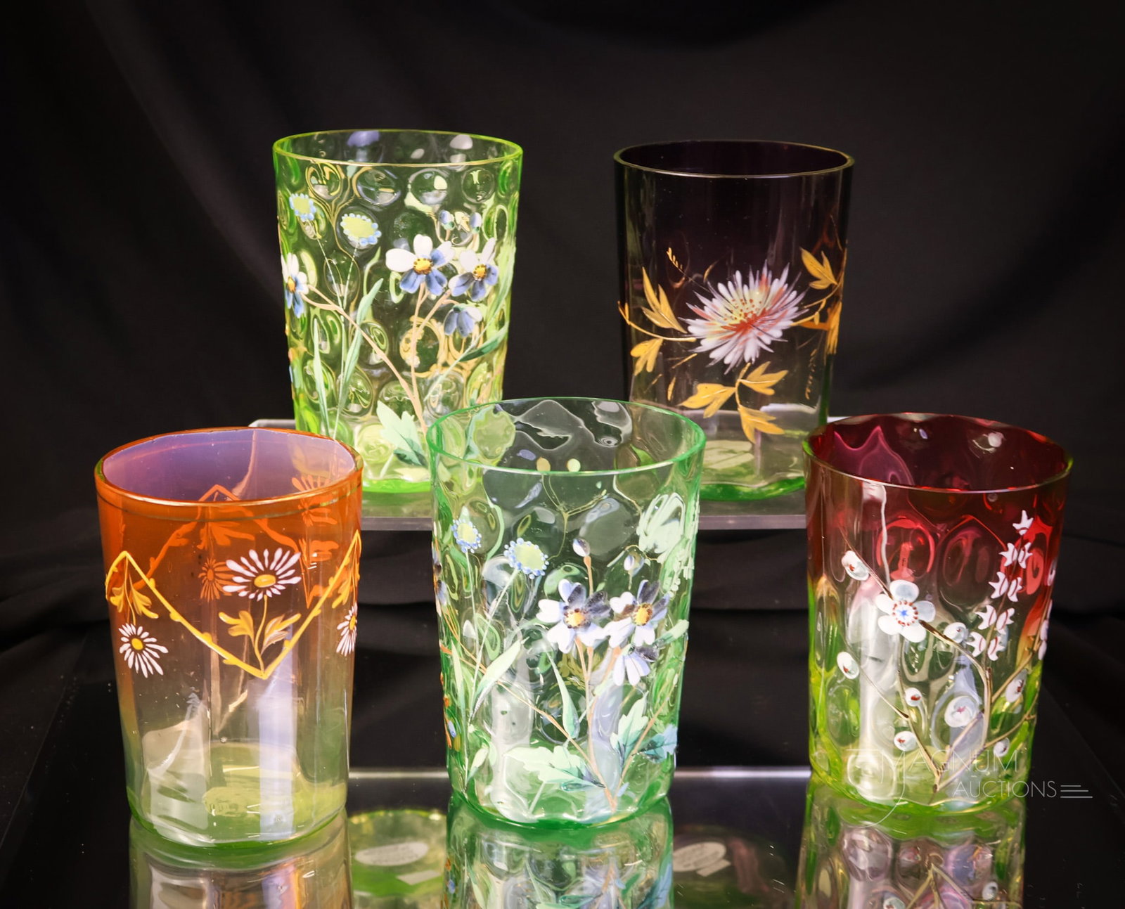 5 pc Lot Victorian Uranium Art Glass Tumblers: A generous offering of five Victorian uranium-rich art glass tumblers. All are enamel decorated. All shine brightly under black light. The tallest measures 4". SHIPPING NOTICE: If you choose not to ut