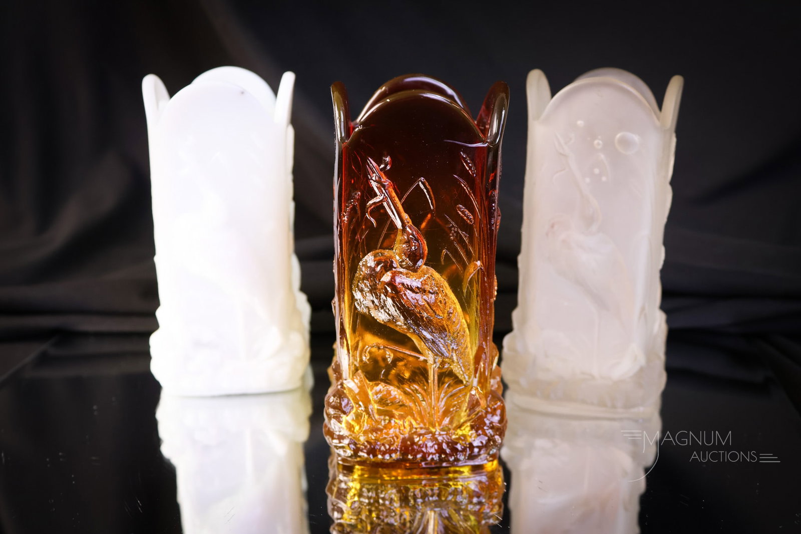 3 pc Lot Victorian New England Glass Stork Vases Amberina & More: Three hard-to-find examples of Victorian New England Glass Stork vases. There is opal, amberina, and clear with a satin finish. Each measures 4 1/2" tall. The amberina exhibits a single chip to the ba