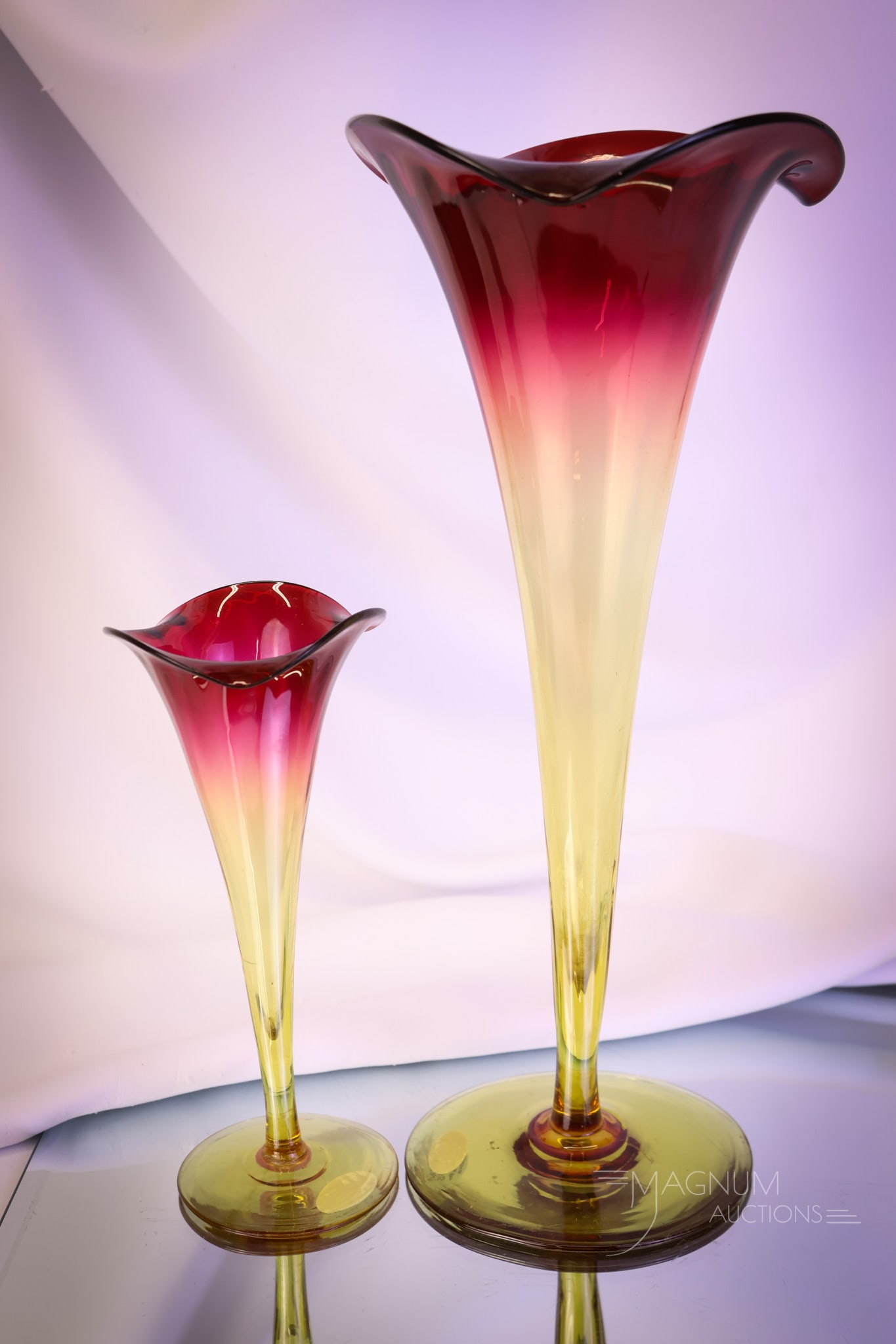 2 pc Lot Victorian Amberina Glass Lily Vases 12 1/2" & More: Two wonderful finds in Victorian amberina glass lily vases. The tallest measures a whopping 12 1/2" tall. The smaller measures 7 1/4" tall. Both have exquisite coloring. SHIPPING NOTICE: If you choose