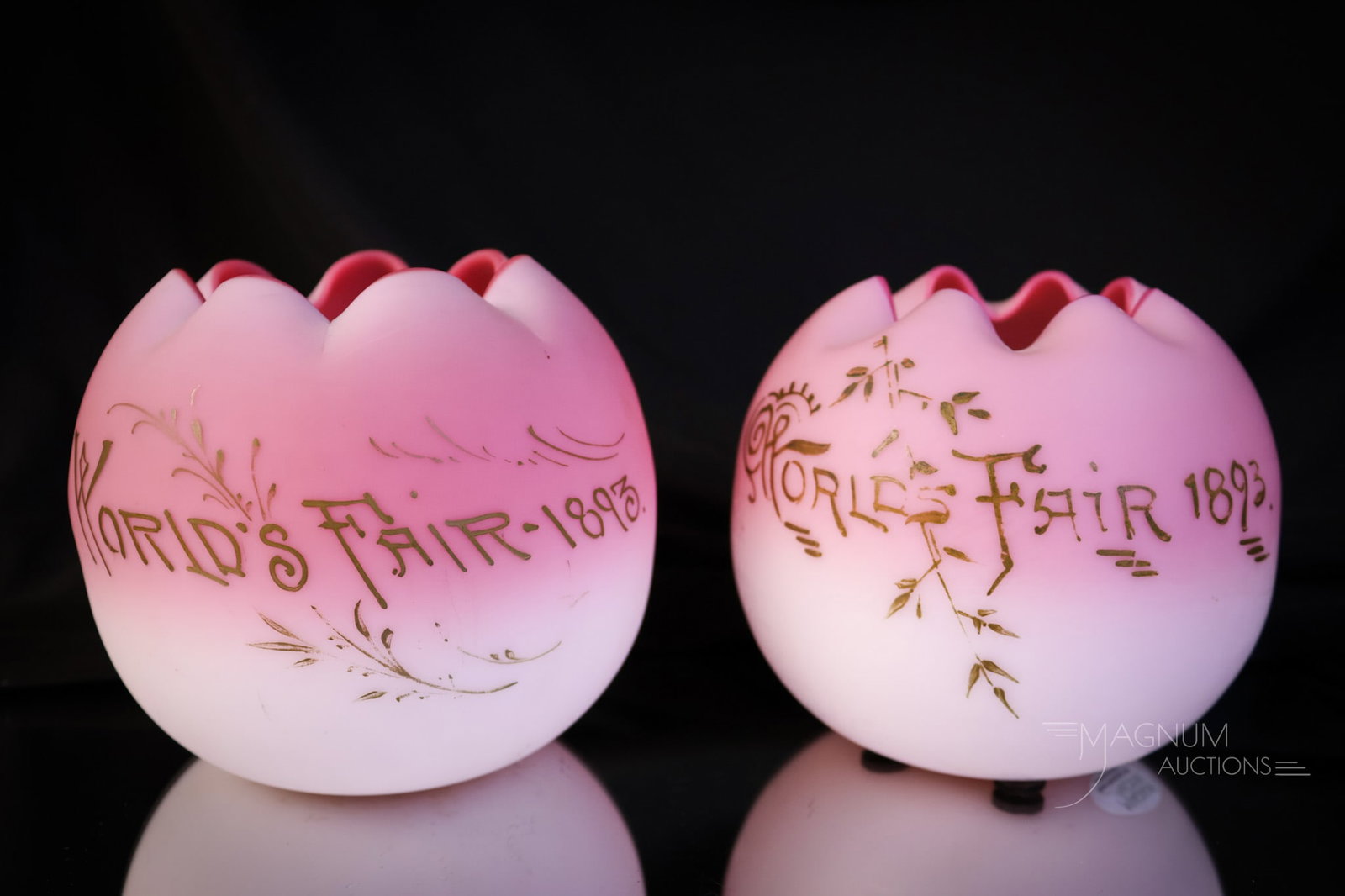 2 pc Lot Libbey Victorian Peachblow Glass"1893 World's Fair" Rosebowls: Two delights in Victorian Libbey Peachblow glass. Both are rosebowls with "1893 World's Fair" decoration in gold. Each has beautiful coloring. The tallest measures 3 1/2". SHIPPING NOTICE: If you choo