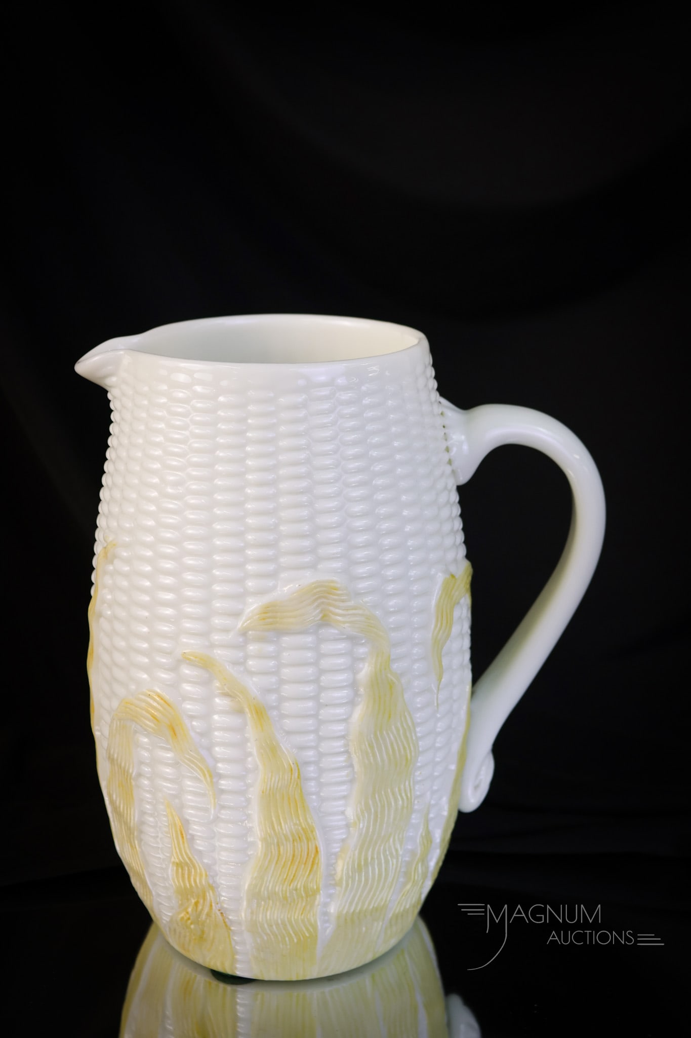 Libbey Maize Custard Victorian Glass Water Pitcher: A fine and rarely found example of the Libbey Maize pattern. This Victorian pitcher is in custard glass with yellow husk decoration. The pitcher measures 8 1/2" tall. SHIPPING NOTICE: If you choose no