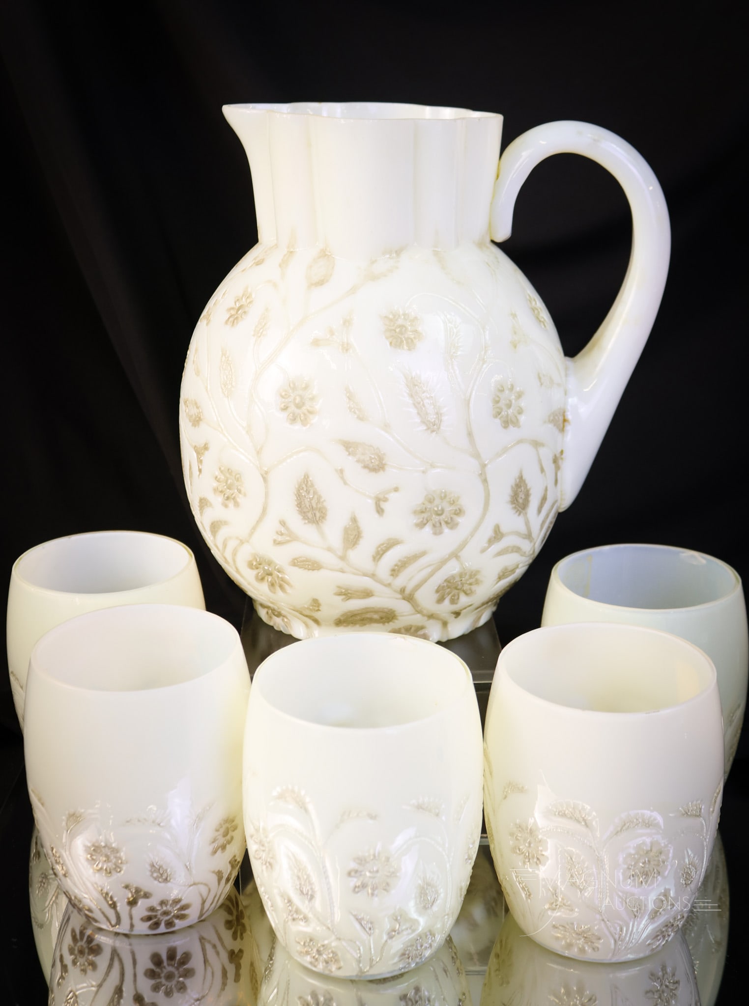 6 pc Victorian Findlay Onyx Water Pitcher & Tumblers: A select offering of a Victorian Findlay Onyx six-piece water set. The set includes a pitcher and five tumblers. All examples are in platinum decoration. The tallest measures 8". One tumbler has a con