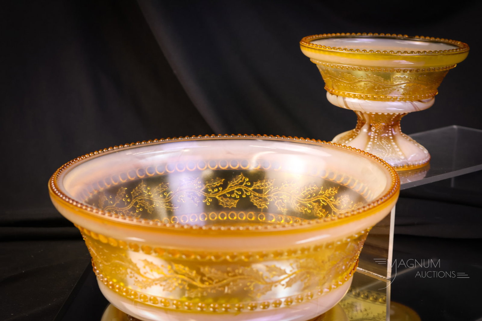 2 pc Lot Victorian Greentown Holly Amber Glass Master Berry Bowl & More: Two examples of Victorian Greentown Holly Amber glass that are collection-enhancing. The first is a master berry bowl. The second is a small pedestal compote. The tallest measures 3 1/4". SHIPPING NOT